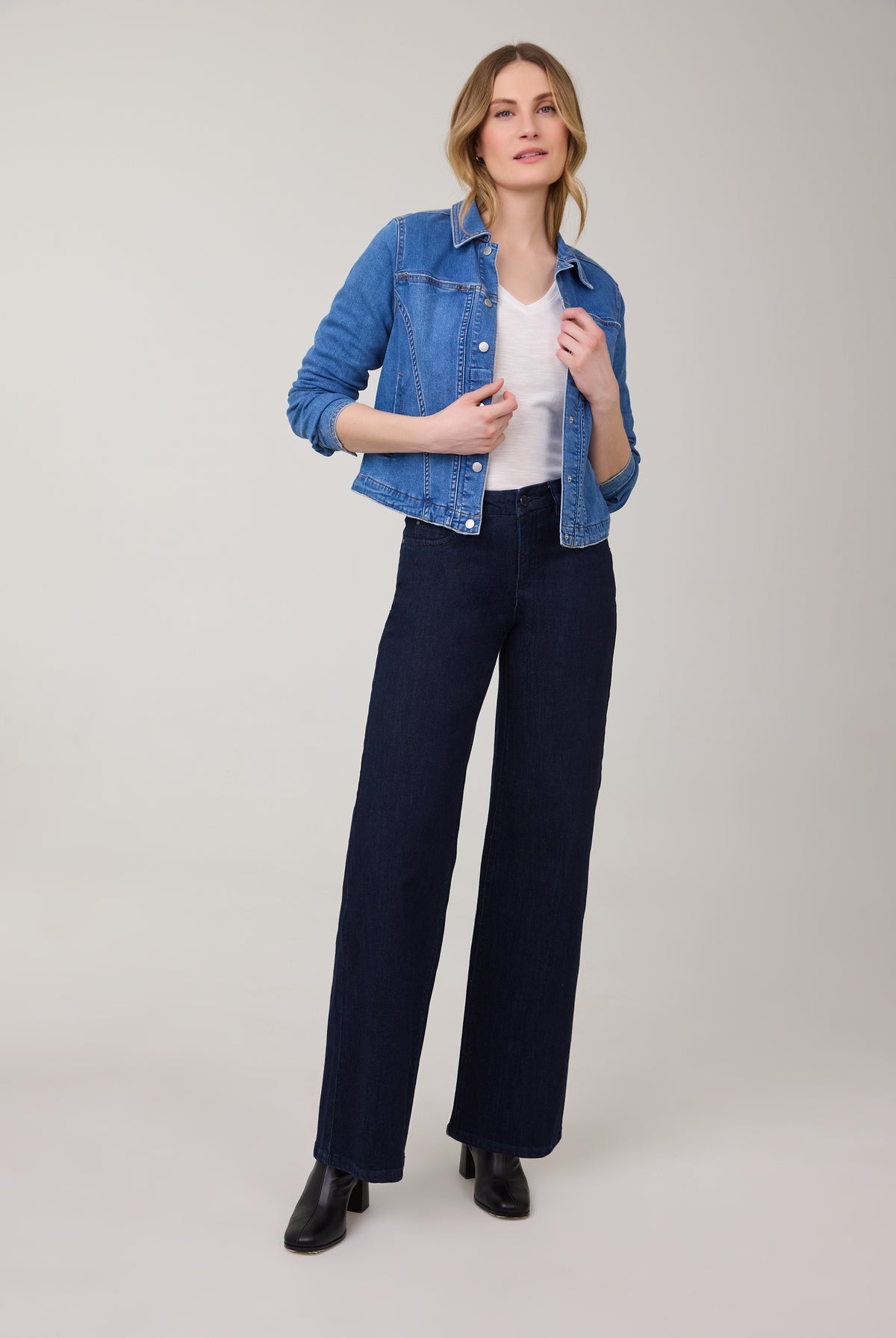 Model in dark Delight wide-leg jeans with denim jacket by French Dressing Jeans (FDJ)