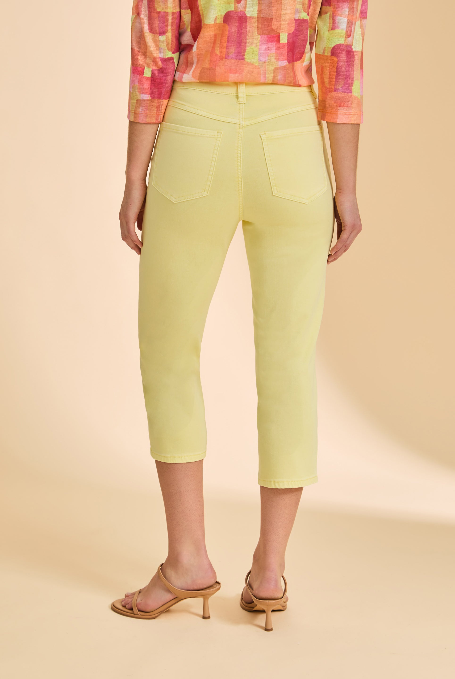 Back view of yellow cropped jeans, highlighting tailored pocket design by French Dressing Jeans (FDJ)