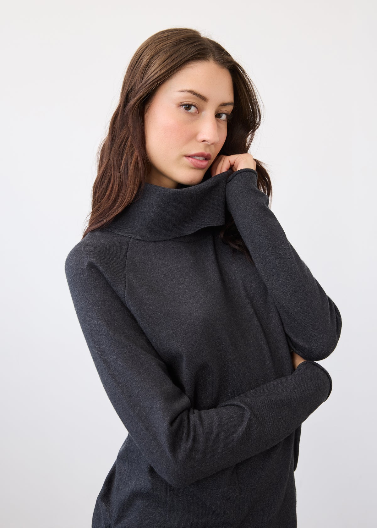 Side profile of charcoal sweater highlighting cowl neck detail by French Dressing Jeans (FDJ)