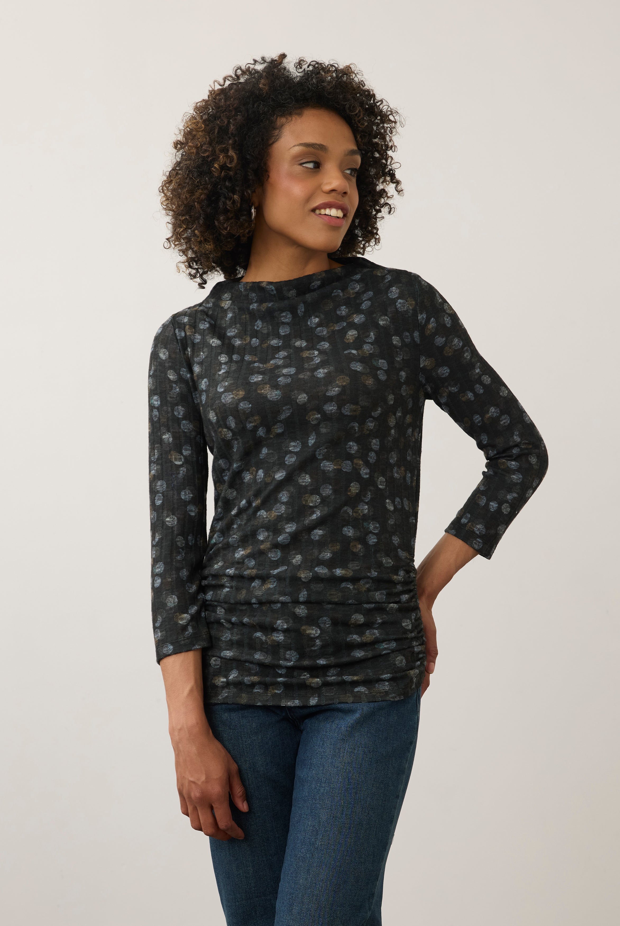Front view of black polka dot top with slim fit and three-quarter sleeves by French Dressing Jeans (FDJ)