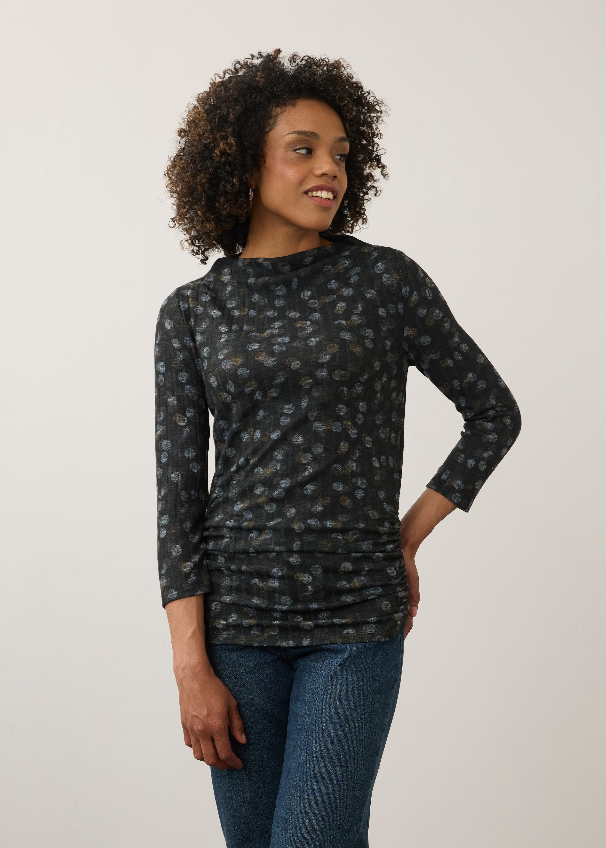 Front view of black polka dot top with slim fit and three-quarter sleeves by French Dressing Jeans (FDJ)