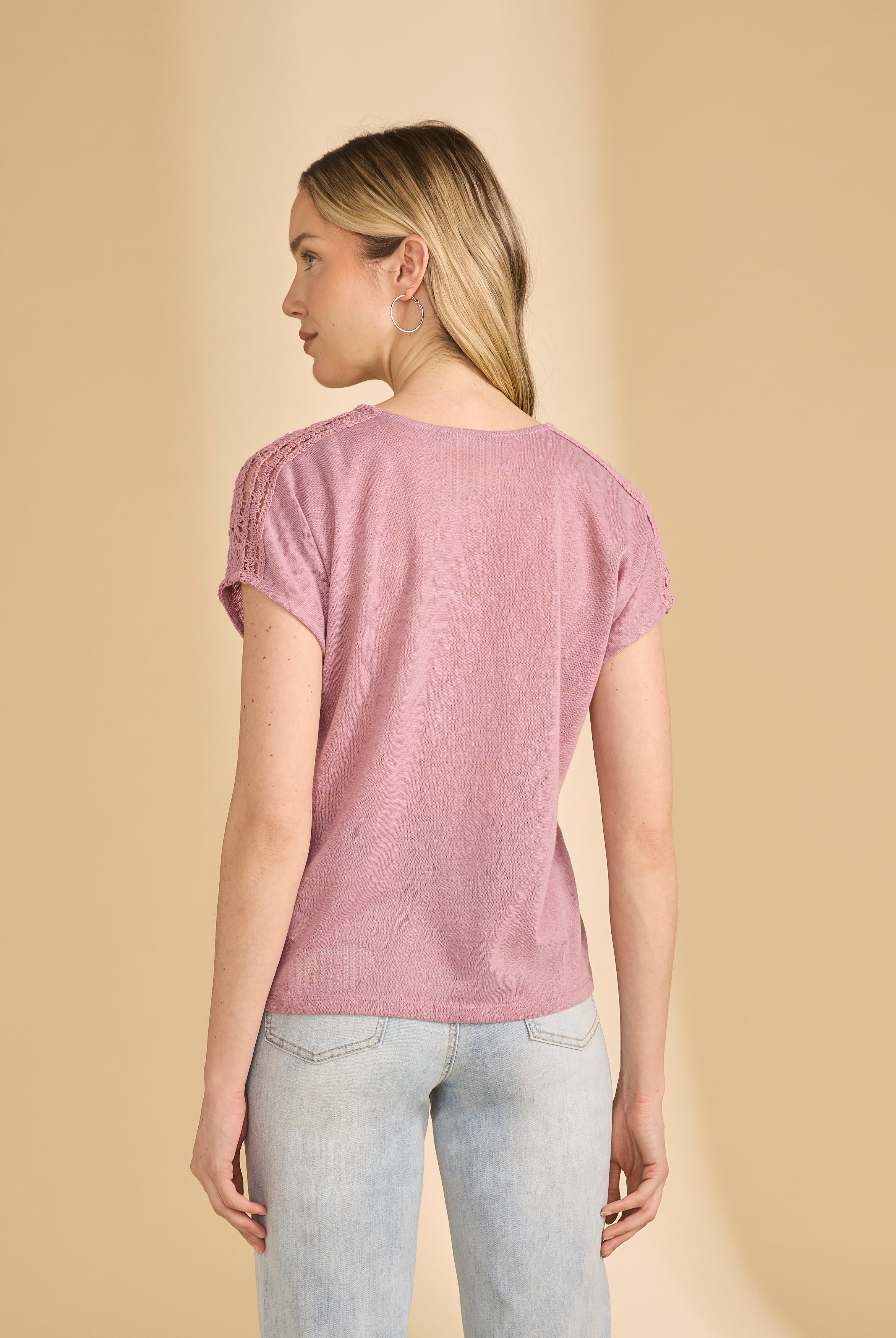 Back view of pink V-neck top highlighting crochet shoulder details by French Dressing Jeans (FDJ)
