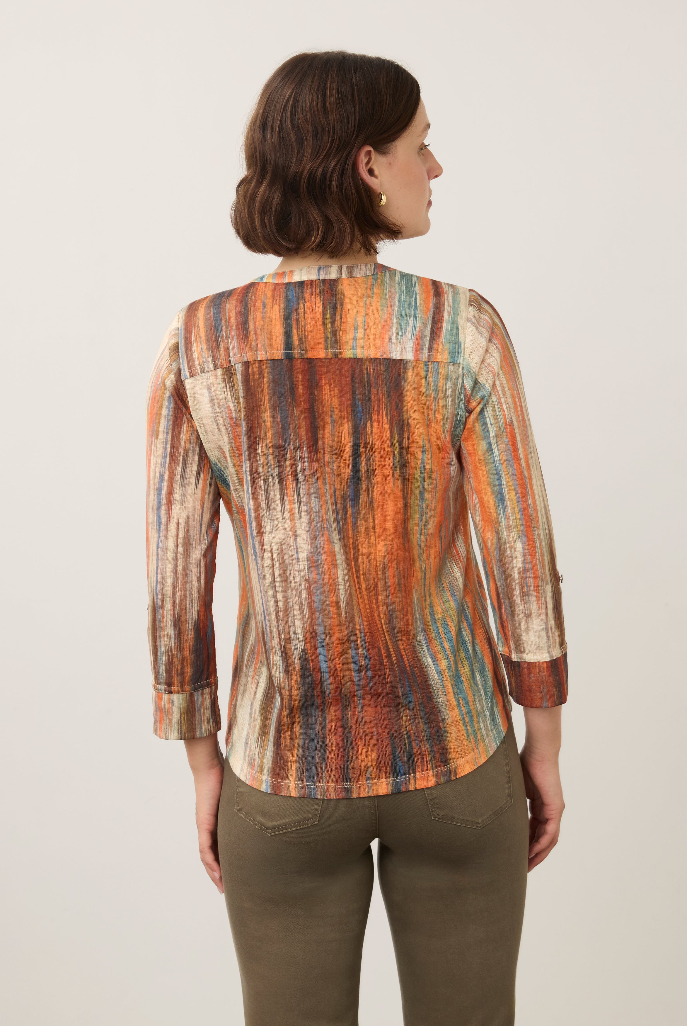 Back view of Heat-colored Henley top showing vibrant pattern and 3/4 sleeves with button detail by French Dressing Jeans (FDJ)