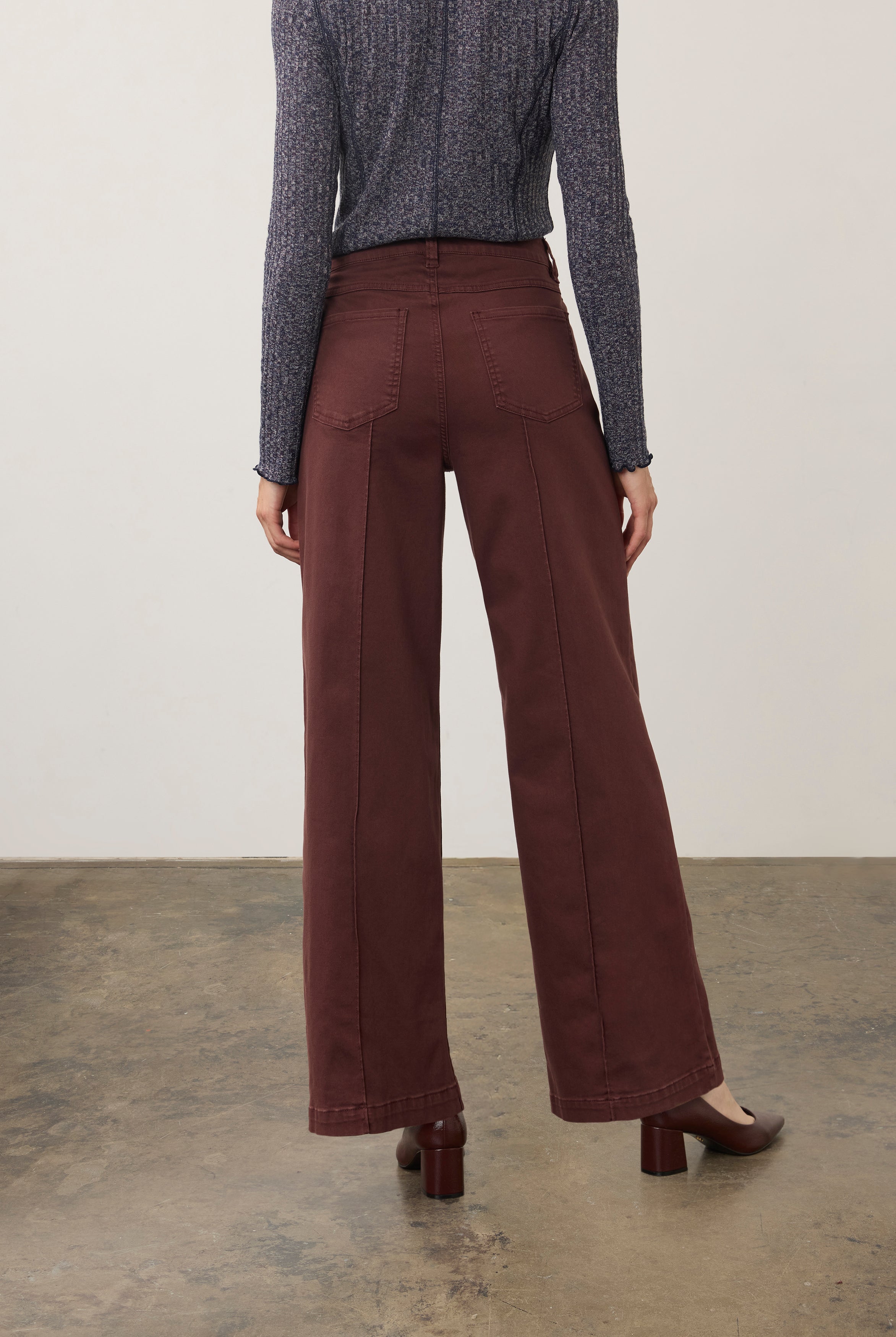 Back view of burgundy wide-leg denim showcasing patch pockets by French Dressing Jeans (FDJ) par French Dressing Jeans (FDJ)