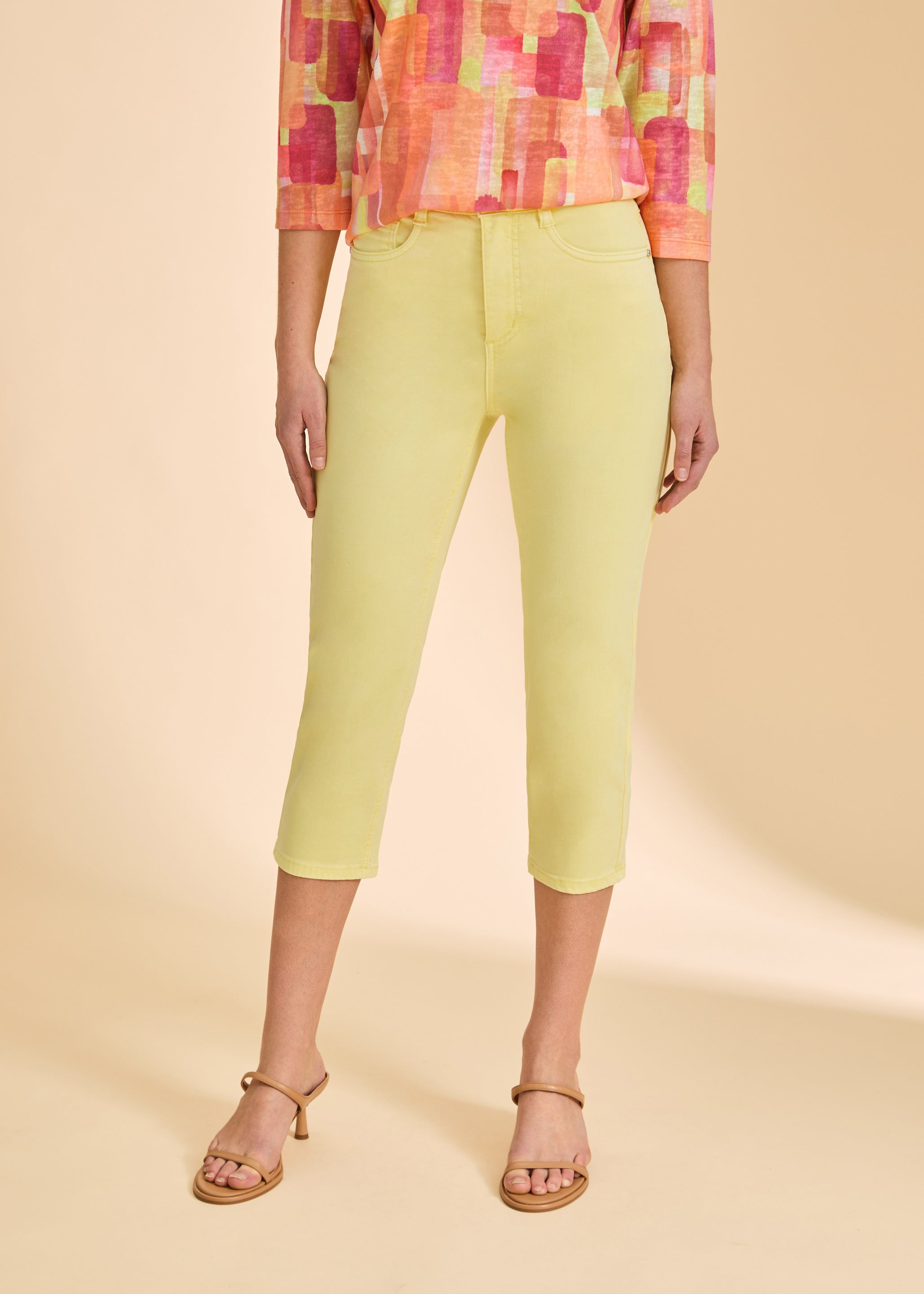 Close-up front view of yellow cropped jeans, showcasing sleek fit by French Dressing Jeans (FDJ)