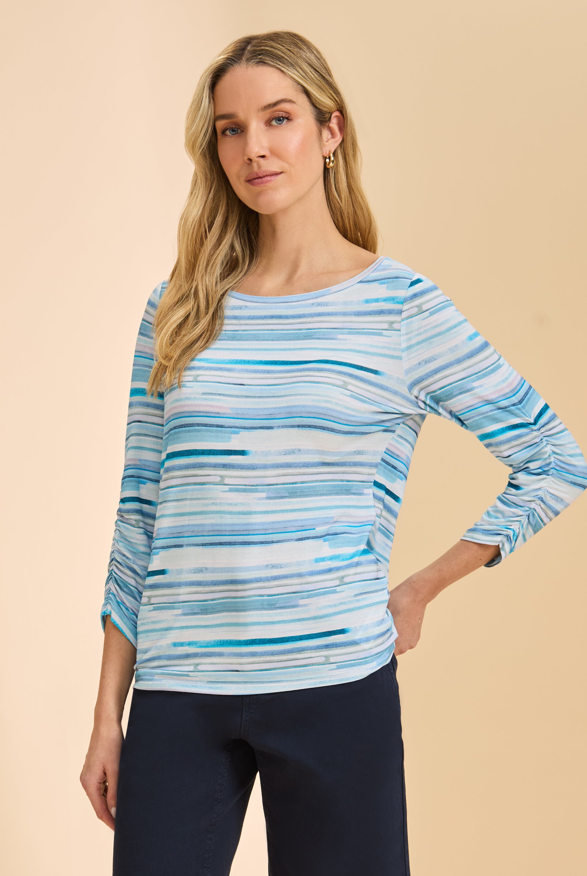 Front view of blue striped top with round neckline and ruched sleeves by French Dressing Jeans (FDJ)