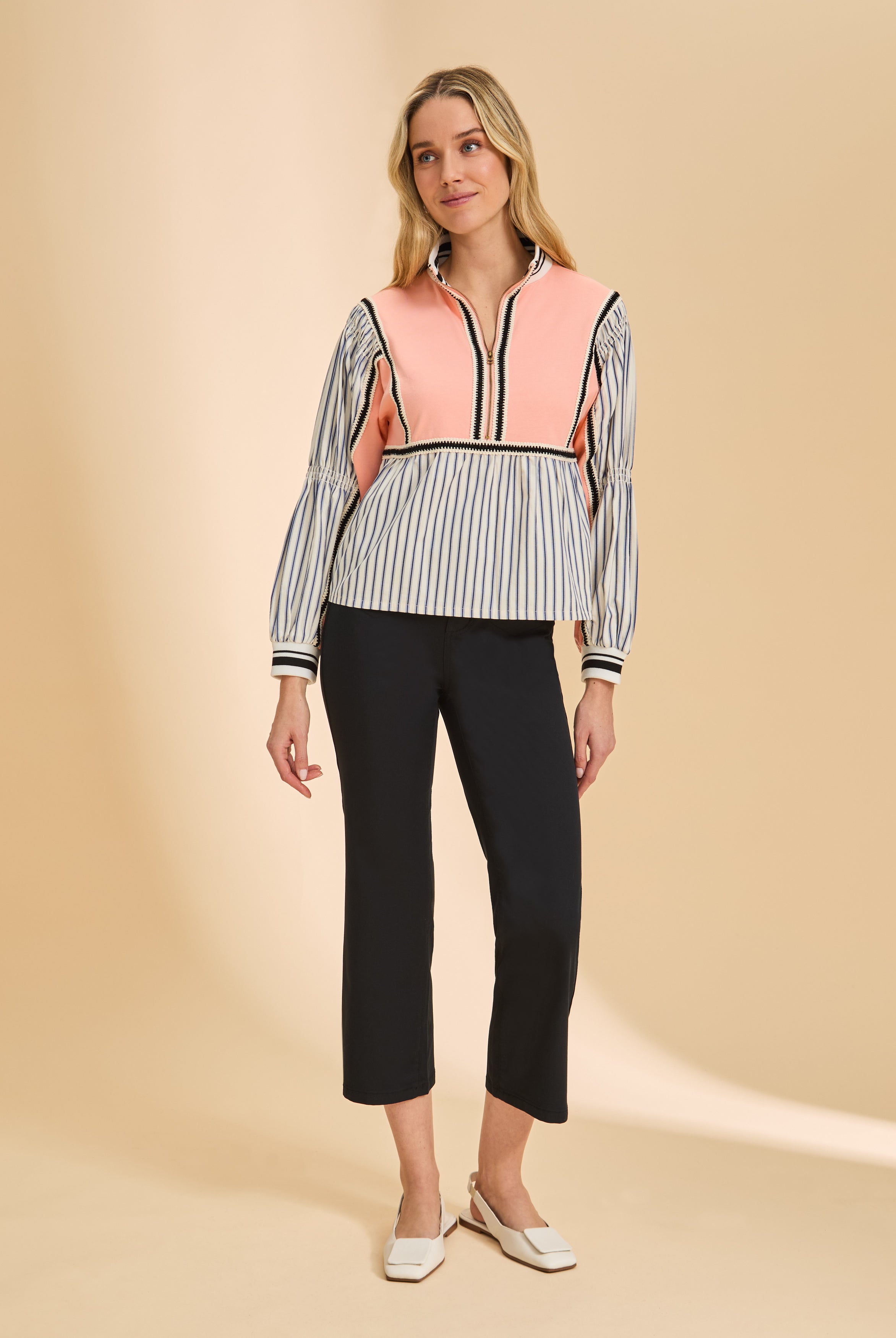 Front view of black crop pants with high-rise waist and fitted design by French Dressing Jeans (FDJ)