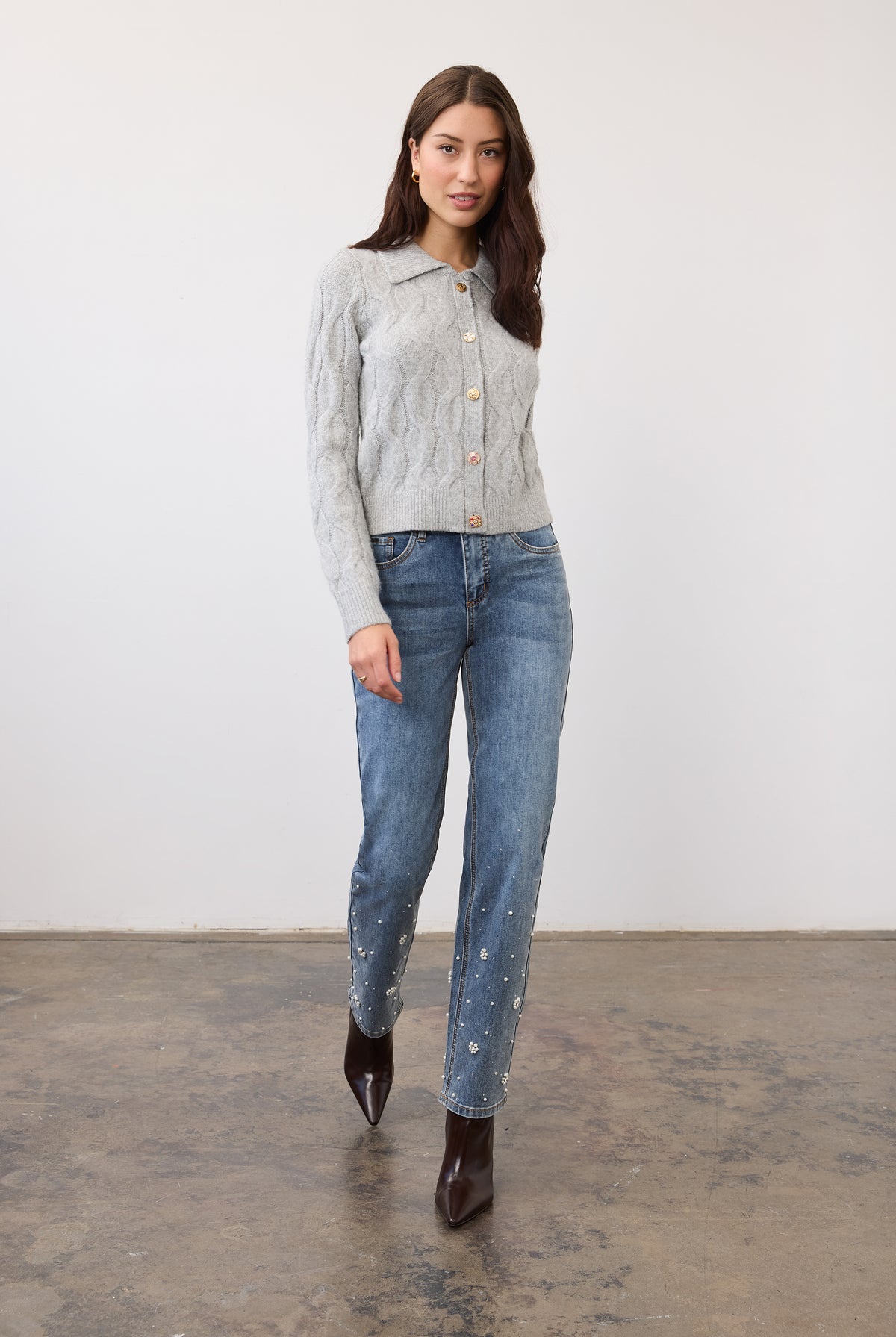 Full view of indigo jeans with pearl embellishments and mid-rise fit by French Dressing Jeans (FDJ)