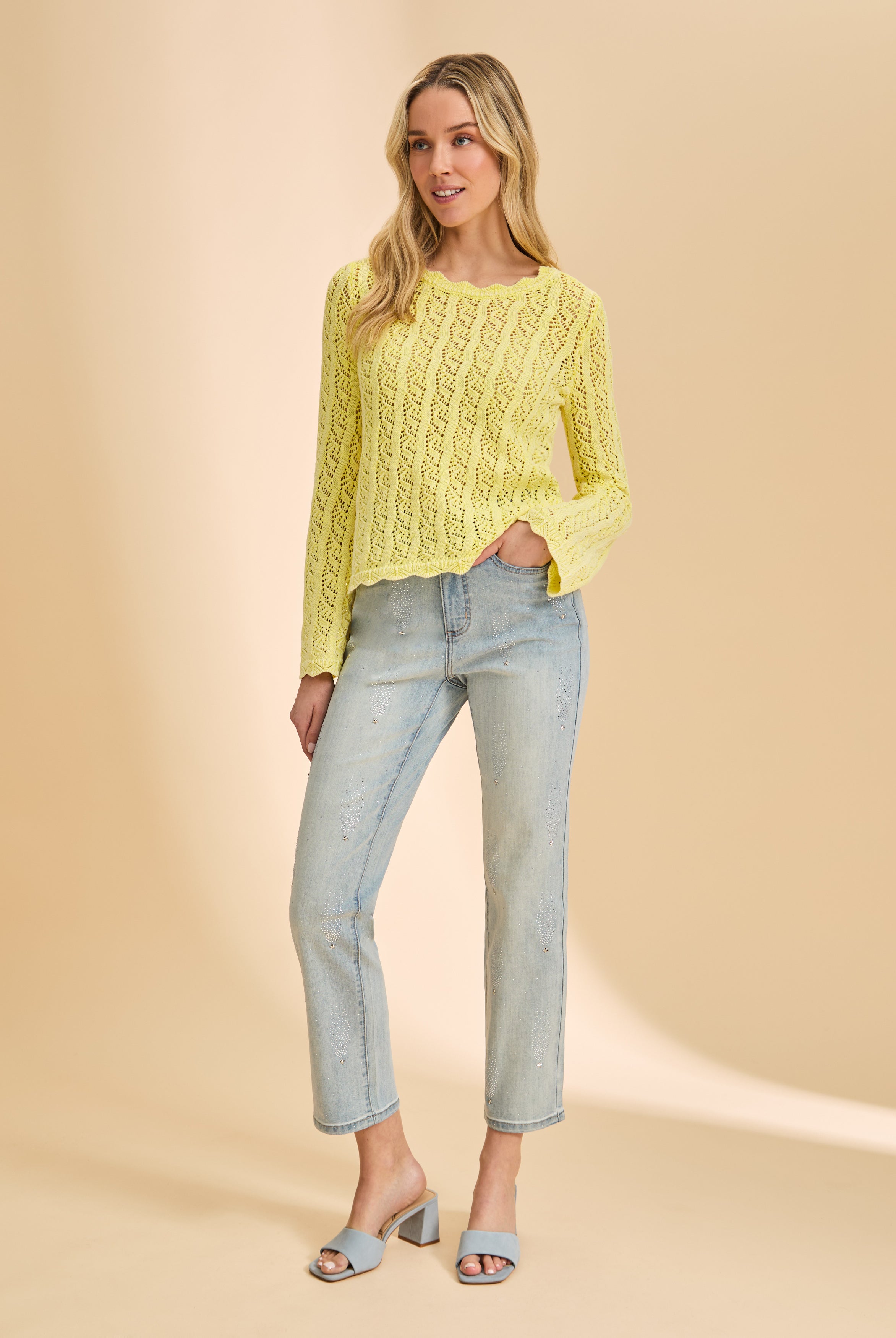 Front view of light wash jeans with subtle embellishments by French Dressing Jeans (FDJ)