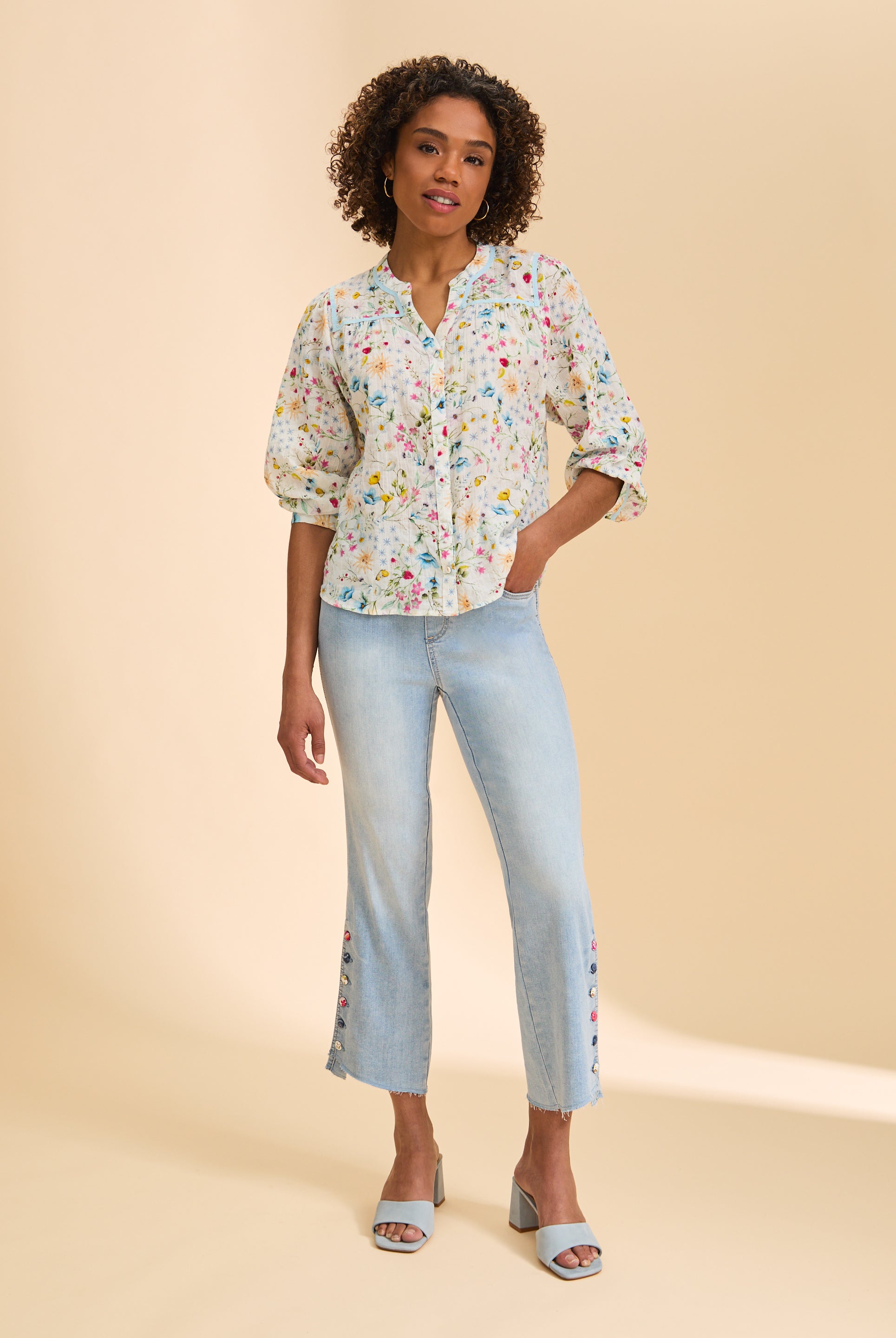 Full view of floral print blouse paired with light jeans by French Dressing Jeans (FDJ)