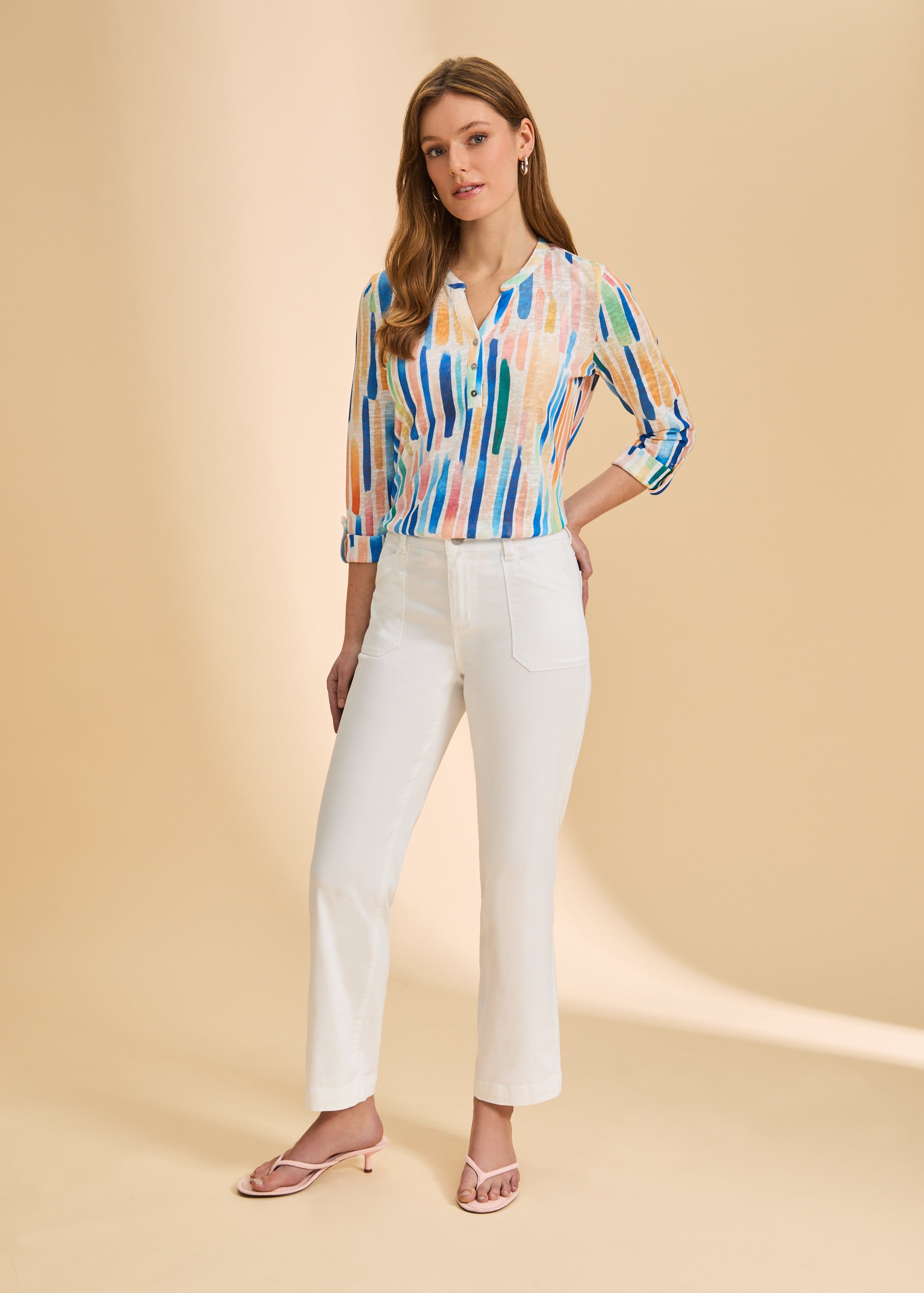 Colorful stripe top with white wide-leg pants full view by French Dressing Jeans (FDJ)