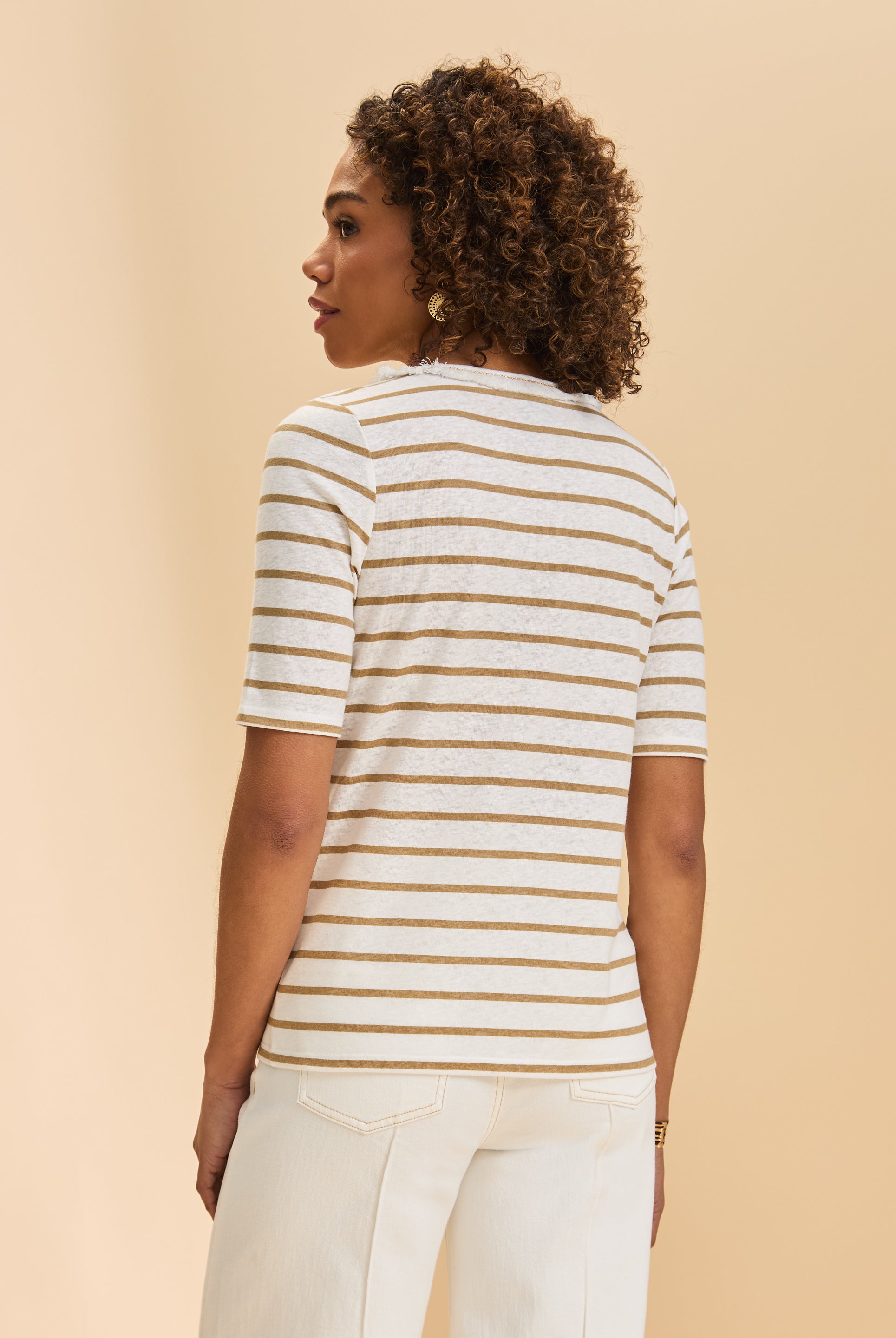 Back view of beige striped V-neck top displaying relaxed fit by French Dressing Jeans (FDJ)