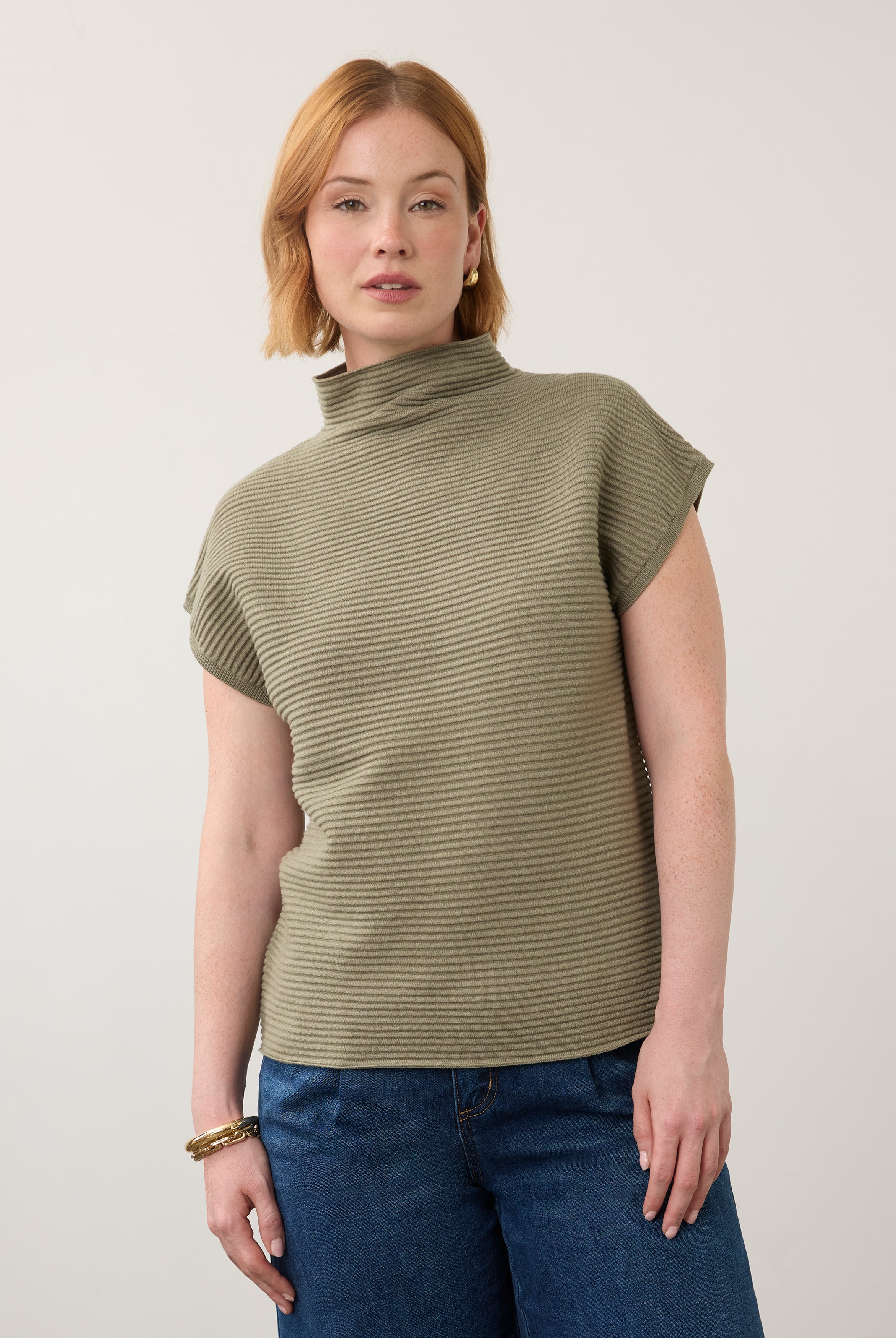 Front view of olive green short sleeve top with ribbed texture and high collar by French Dressing Jeans (FDJ)