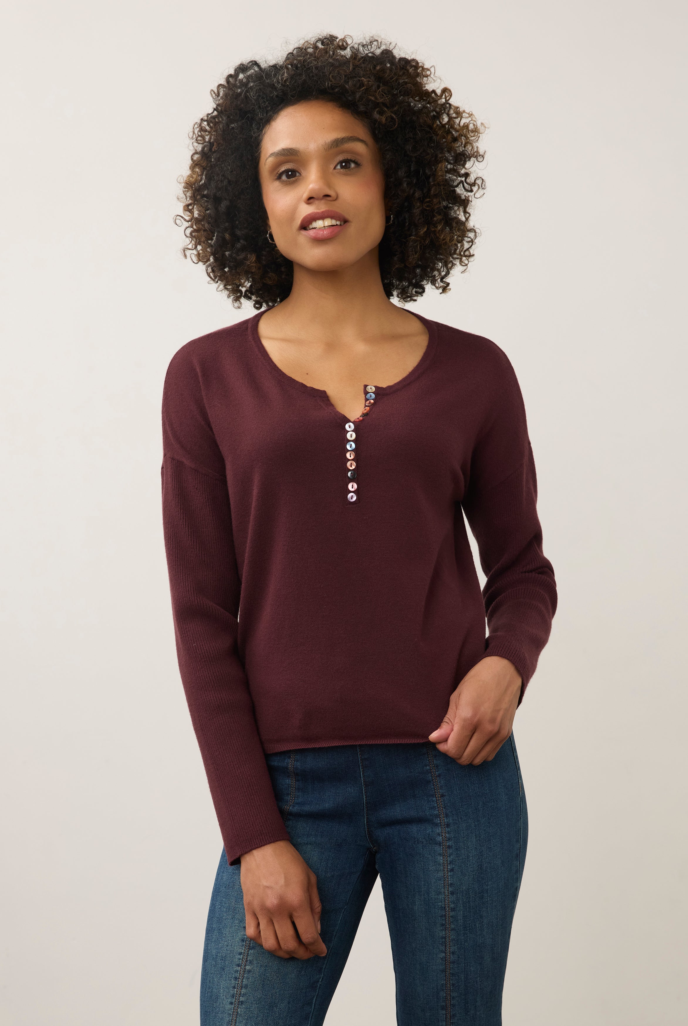 Front view of burgundy sweater with colorful button detail by French Dressing Jeans (FDJ)