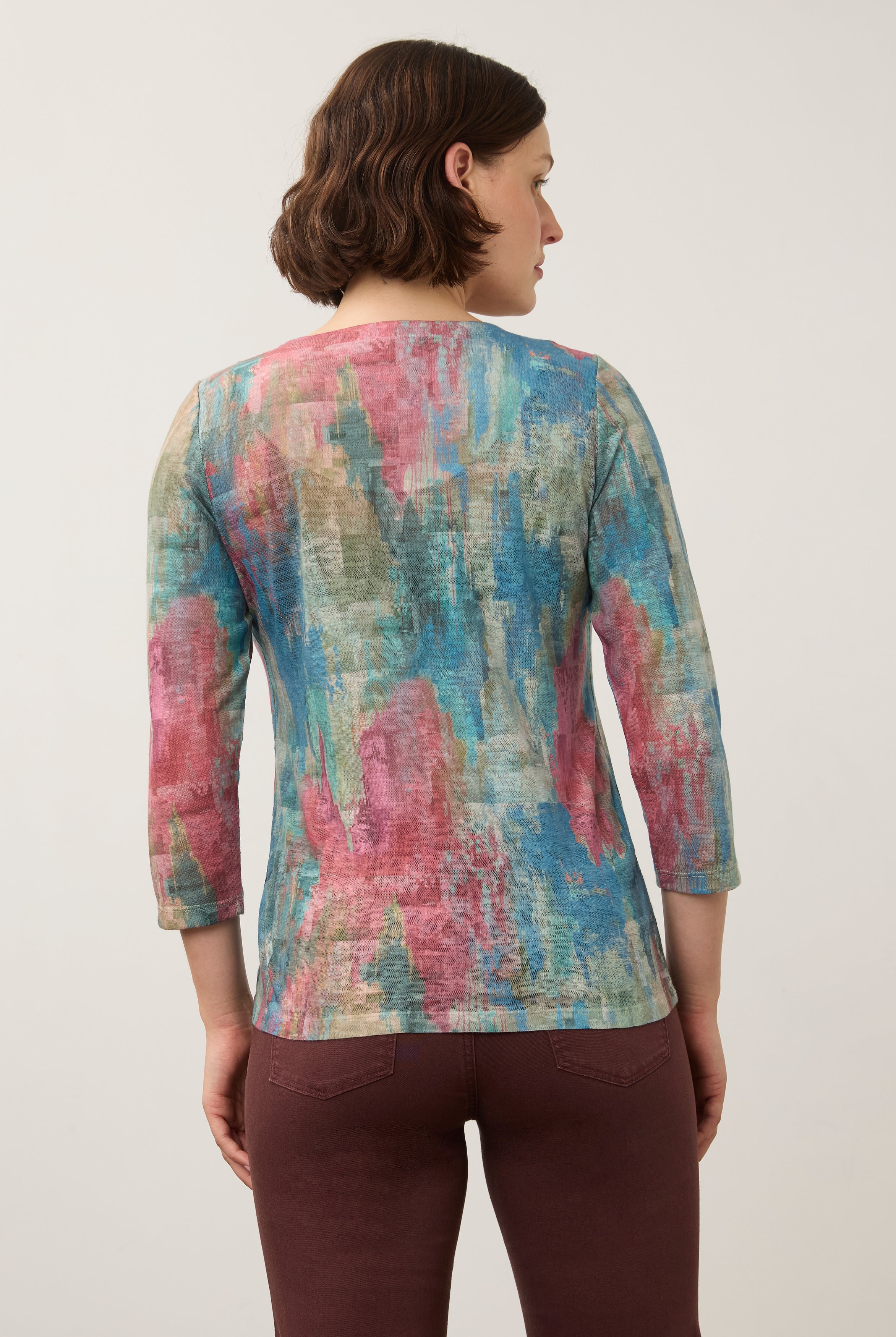 Back view of pastel Henley top with colorful abstract pattern and 3/4 sleeves by French Dressing Jeans (FDJ)