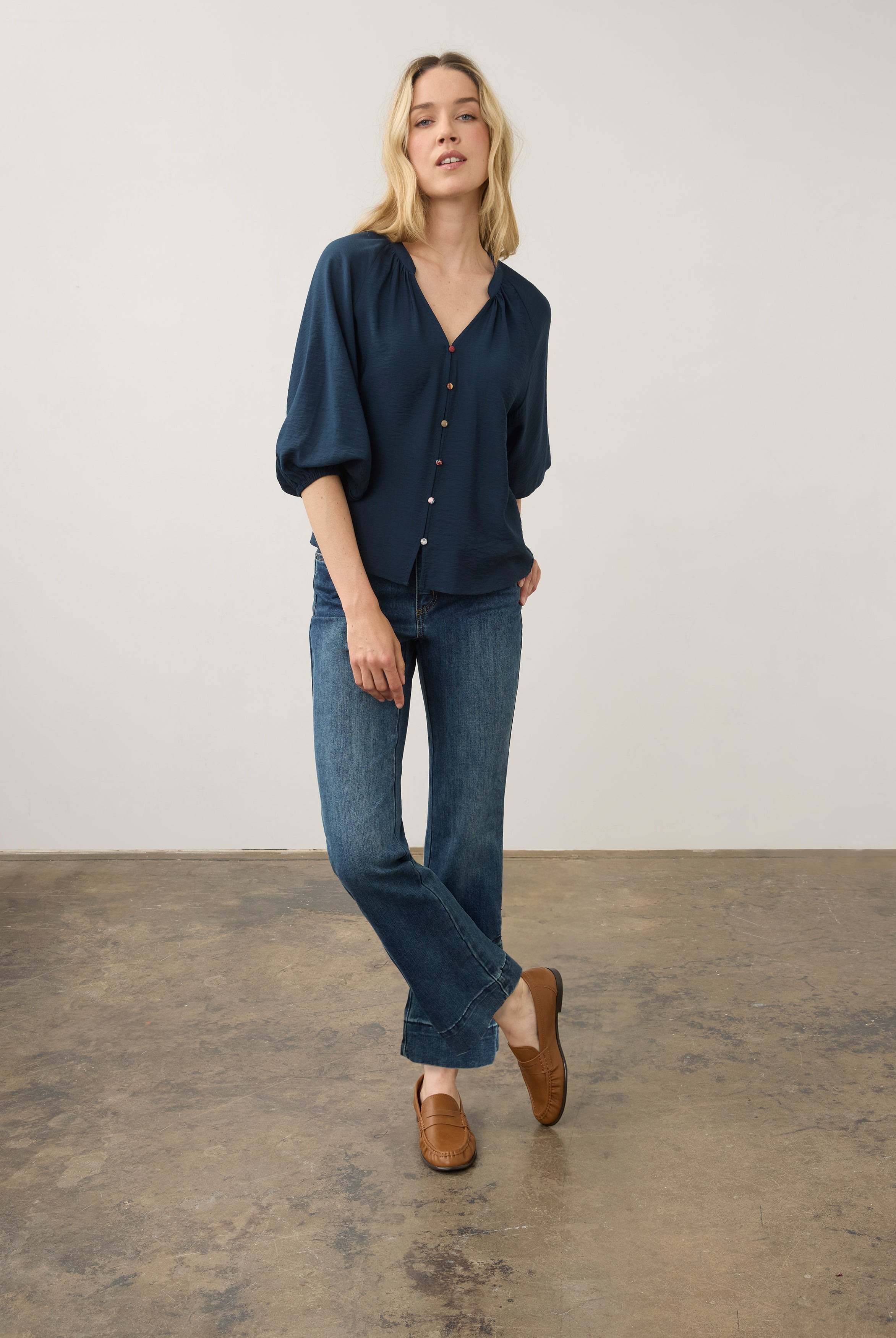 Full body view of medium blue Olivia denim emphasizing sleek design and patch pockets by French Dressing Jeans (FDJ)