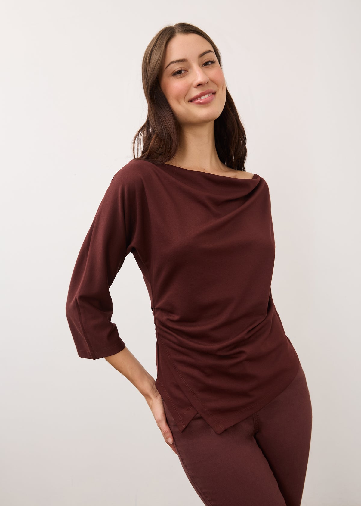 Front view of burgundy top with draped neckline and quarter sleeves by French Dressing Jeans (FDJ)