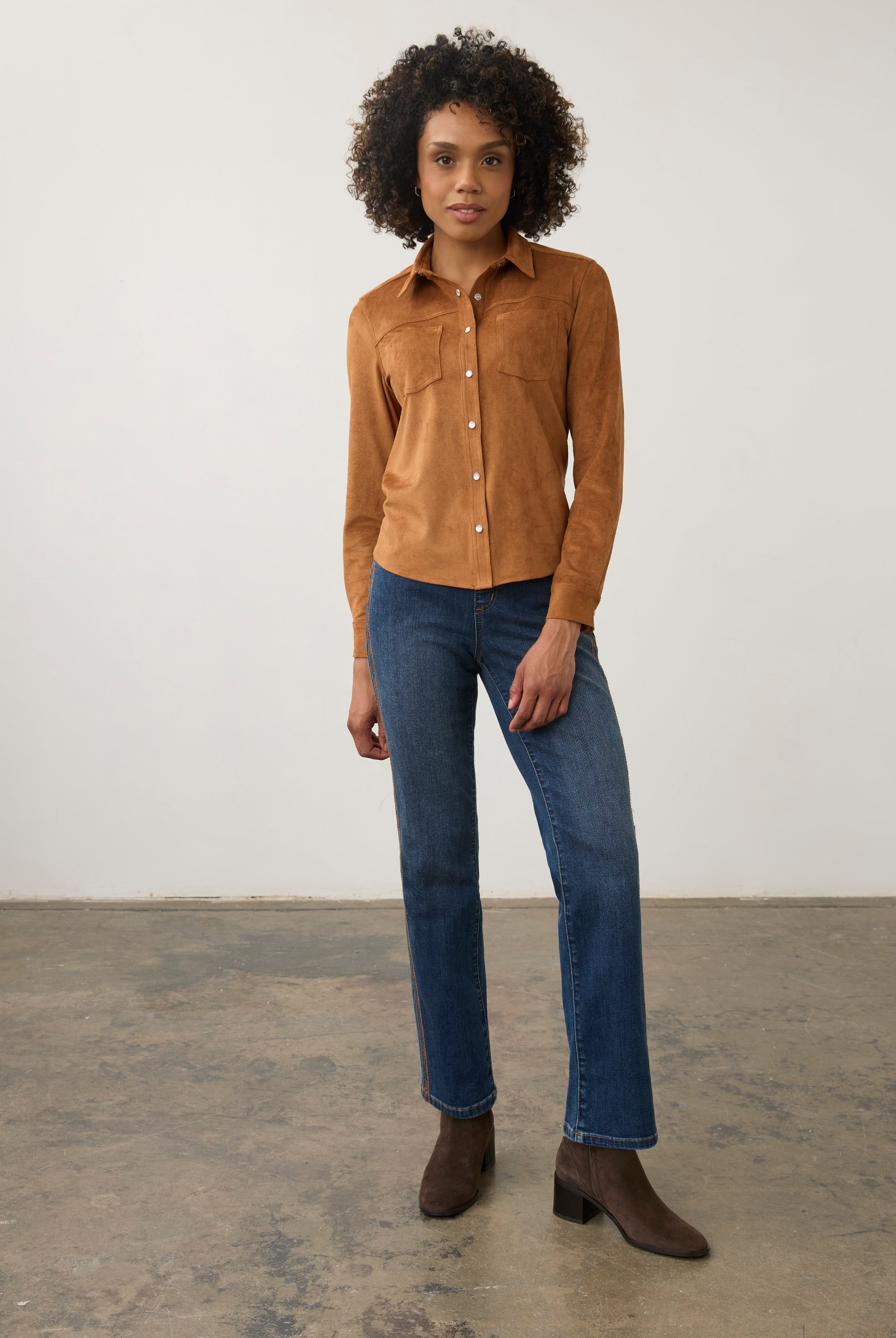 Model in medium blue jeans with tan top, full view showcasing straight leg fit by French Dressing Jeans (FDJ) par French Dressing Jeans (FDJ)