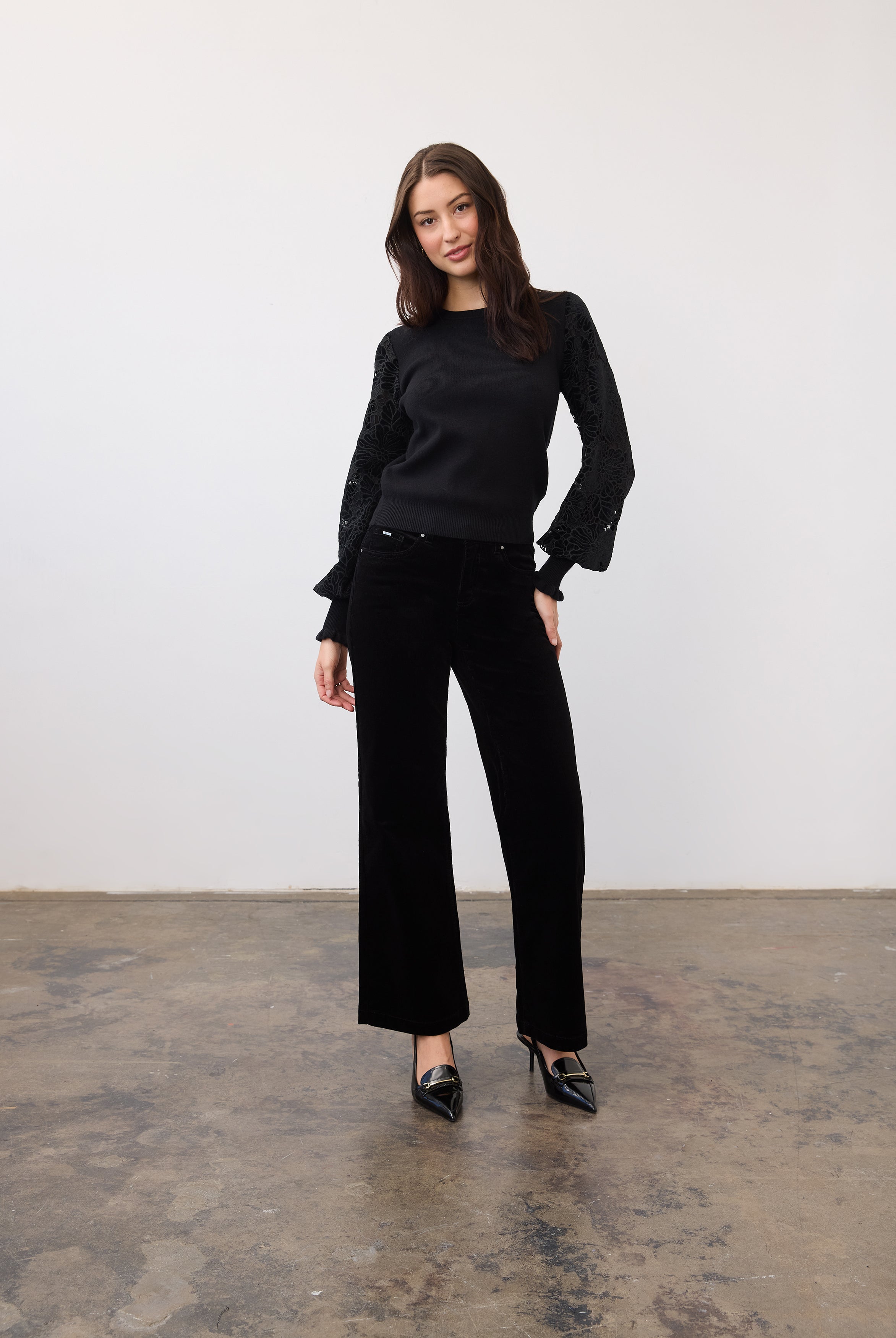Full outfit view with black sweater and velvet sleeves, styled with black pants by French Dressing Jeans (FDJ)