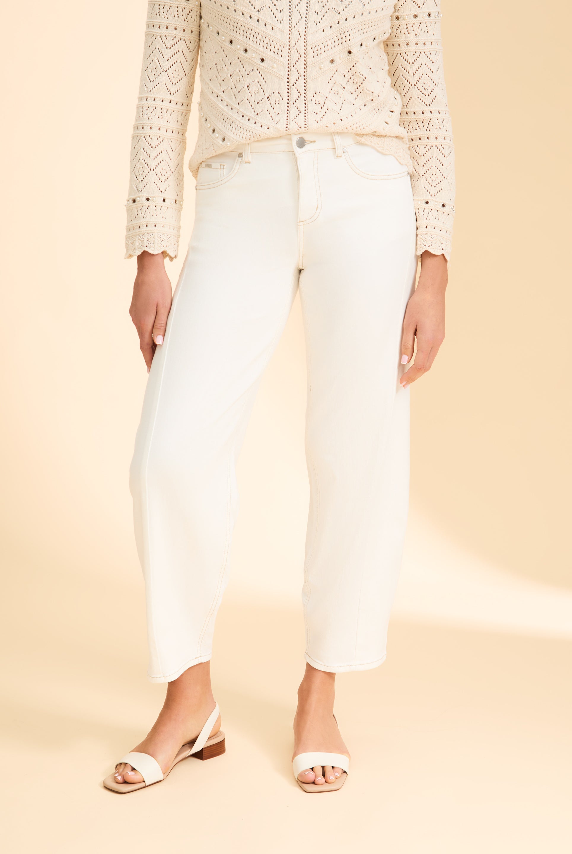 Close-up of front waist and pocket design on ivory Suzanne jeans by French Dressing Jeans (FDJ)