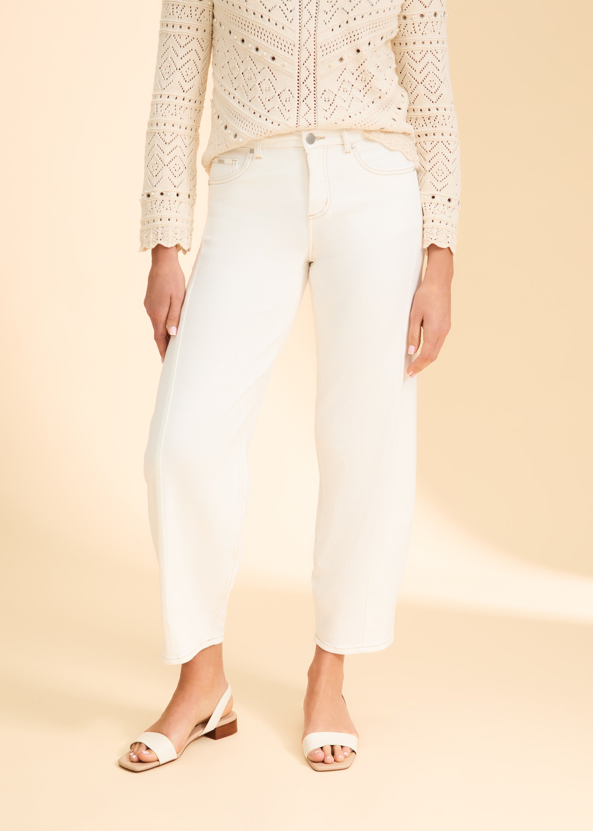 Close-up of front waist and pocket design on ivory Suzanne jeans by French Dressing Jeans (FDJ)