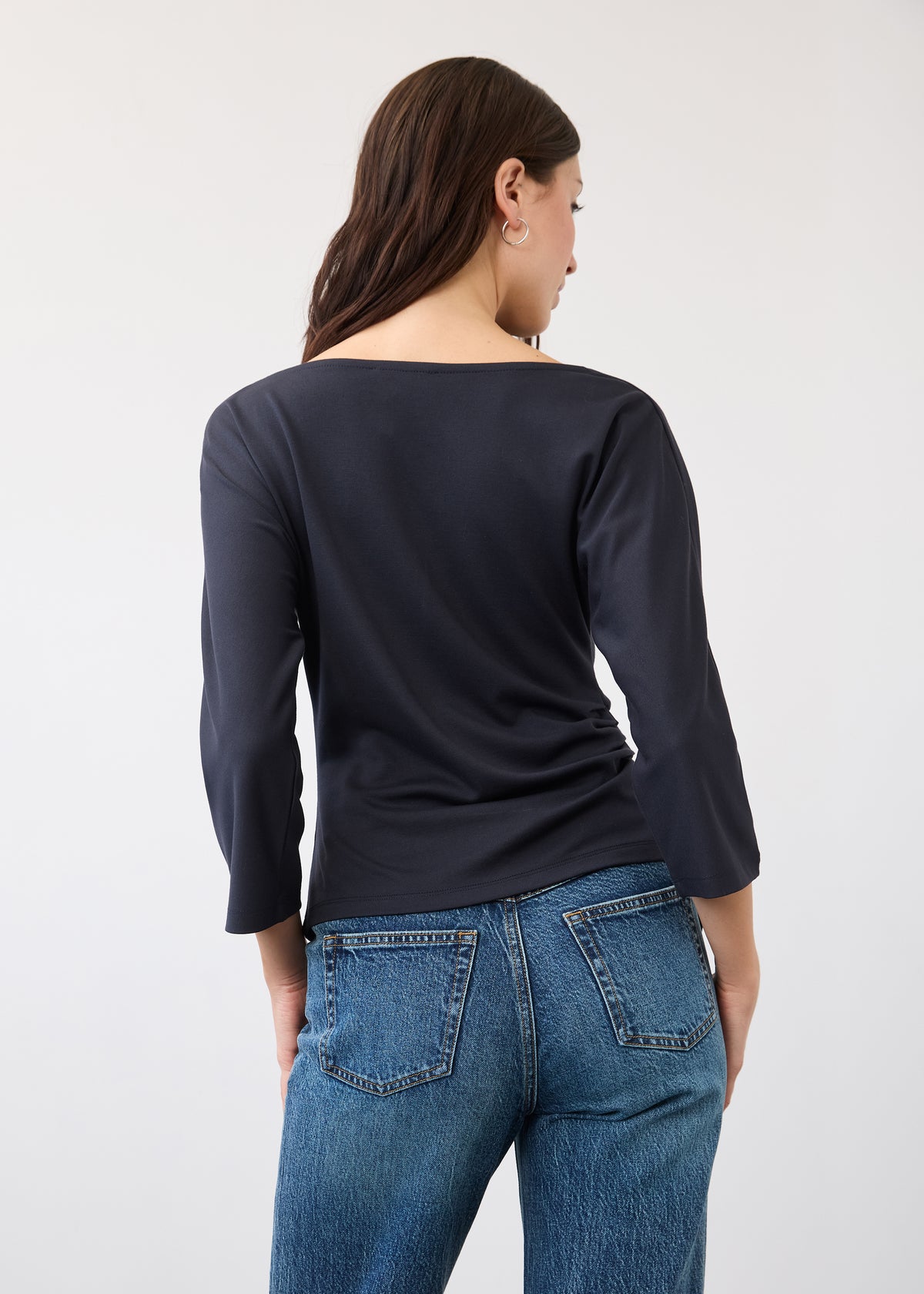 Back view of navy top showing seamless look and quarter sleeves by French Dressing Jeans (FDJ)