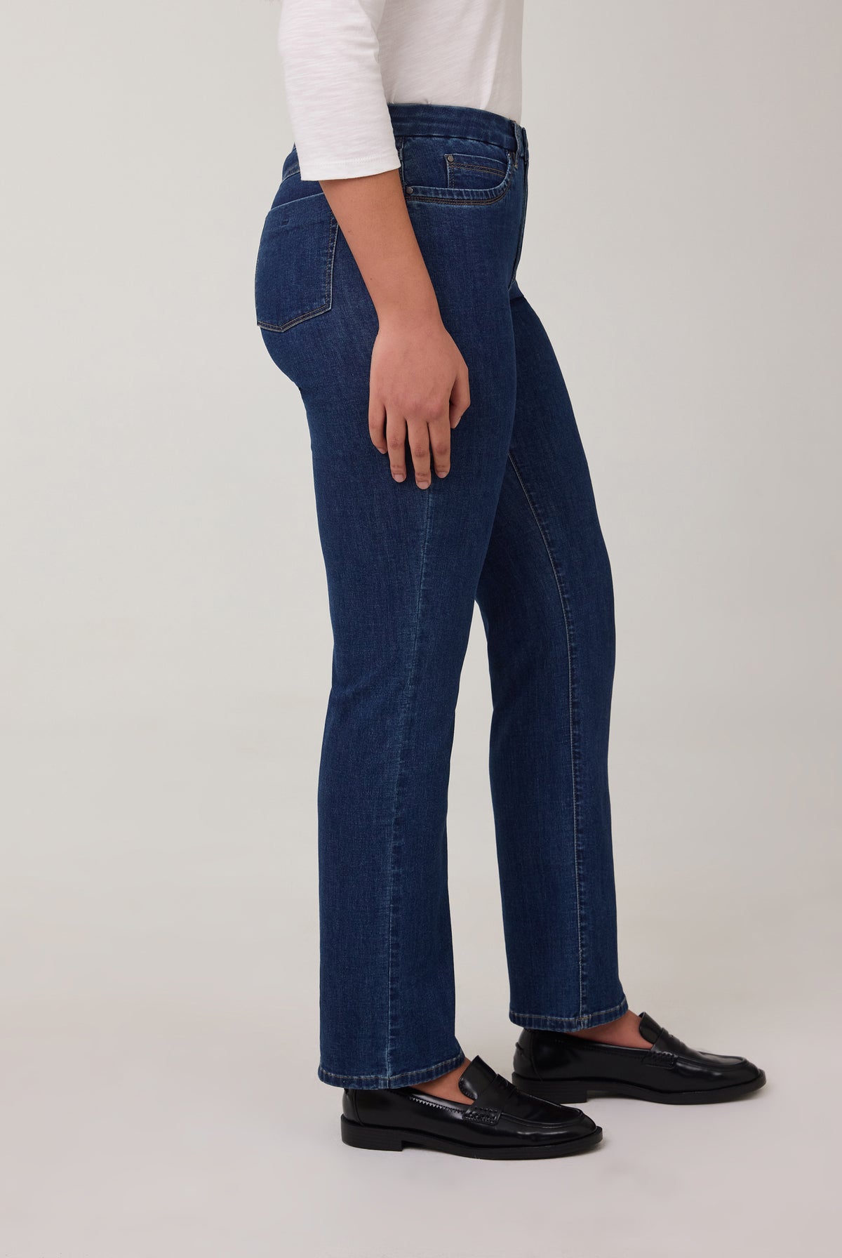 Side view of tapered straight leg jeans in Delight color by French Dressing Jeans (FDJ)