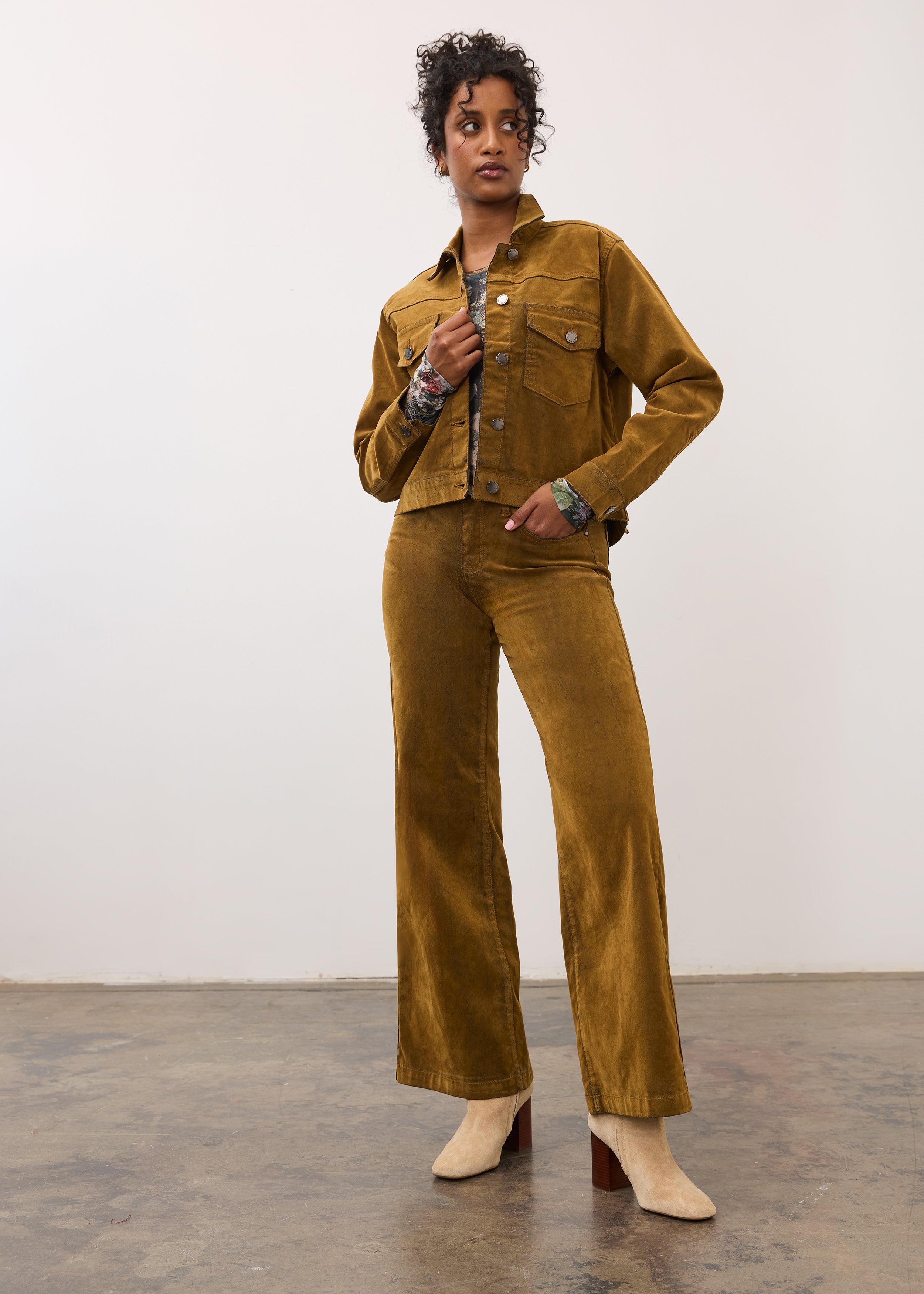 Full outfit view with brass Olivia wide leg denim and jacket in a fashion pose by French Dressing Jeans (FDJ)
