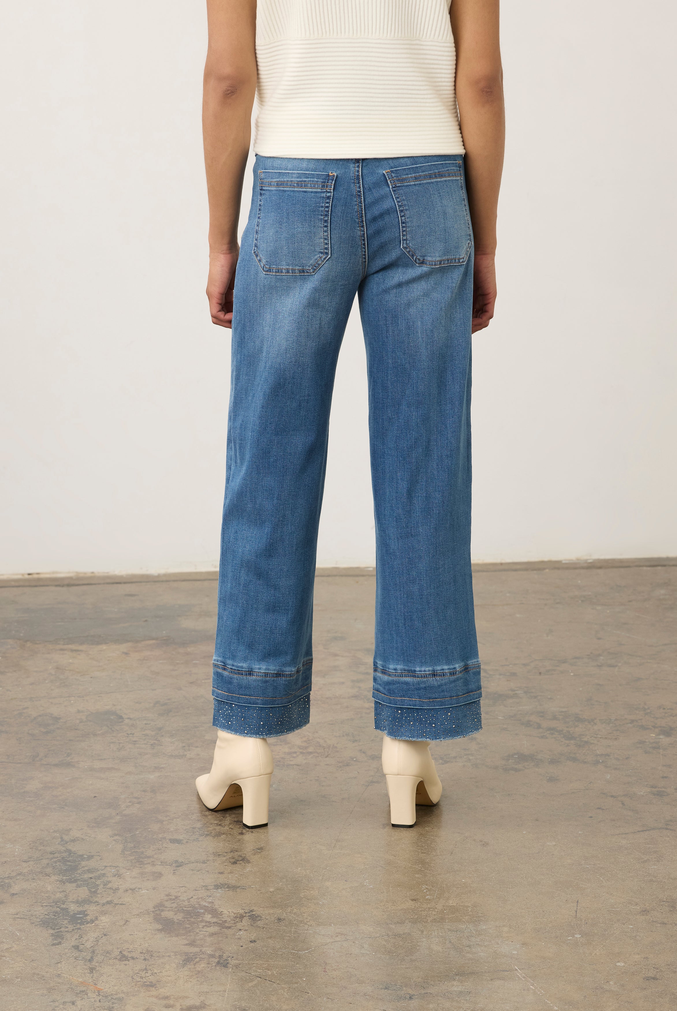 Back view of medium blue pull-on wide ankle denim with back patch pockets by French Dressing Jeans (FDJ) par French Dressing Jeans (FDJ)