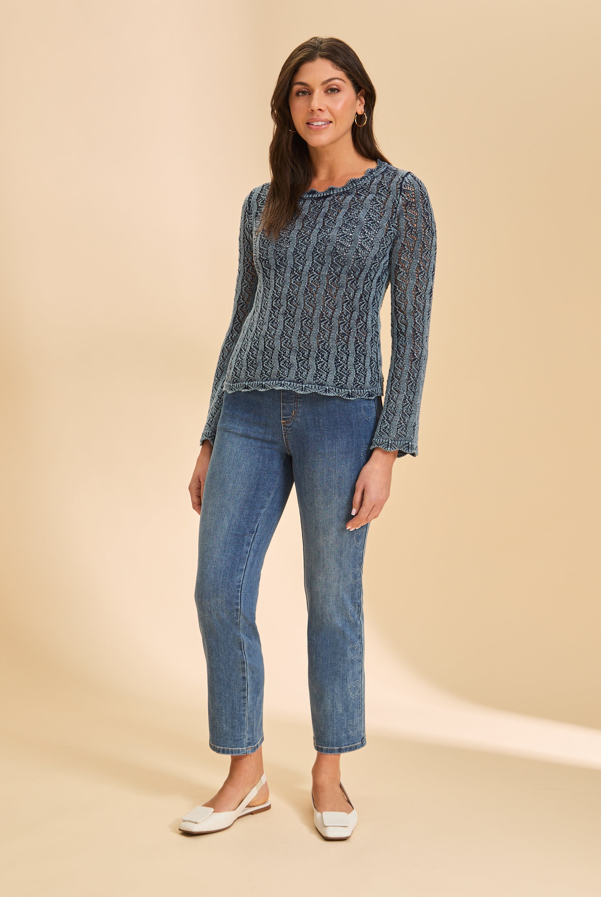 Model wearing indigo straight leg jeans with heart detail by French Dressing Jeans (FDJ)