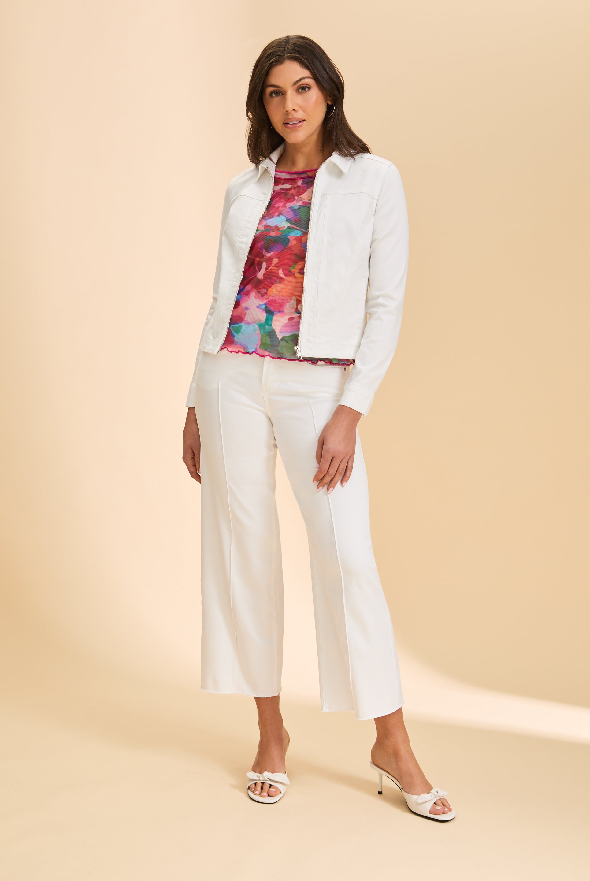 White jacket styled with floral top and pants by French Dressing Jeans (FDJ)