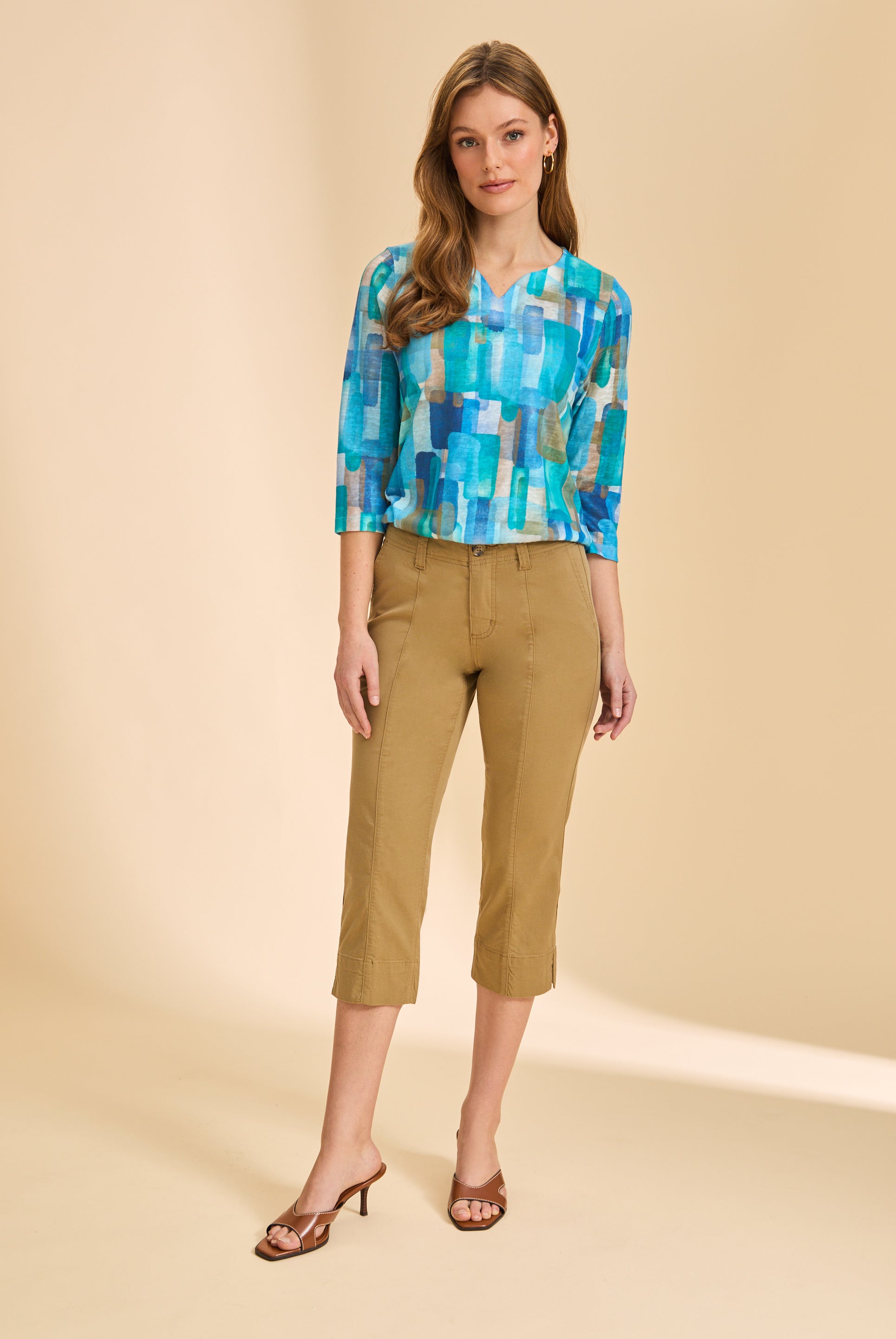 Full-body view of turquoise block print top with tan pants by French Dressing Jeans (FDJ)