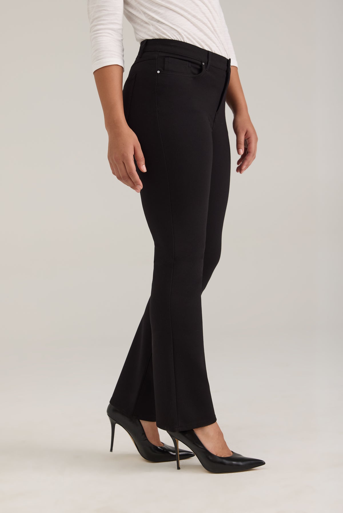 Side view of black pants showing ankle length and fit by French Dressing Jeans (FDJ)