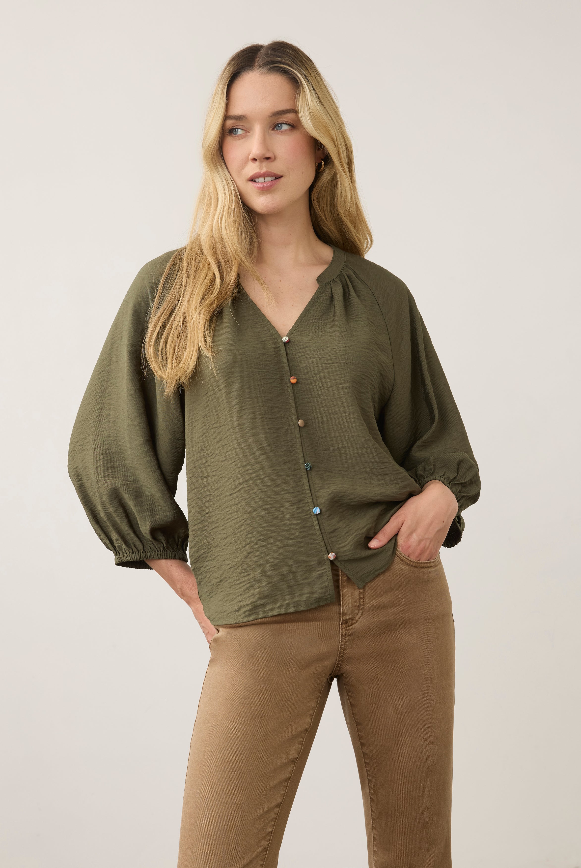 Front view of olive blouse with colorful buttons and V-neck by French Dressing Jeans (FDJ)