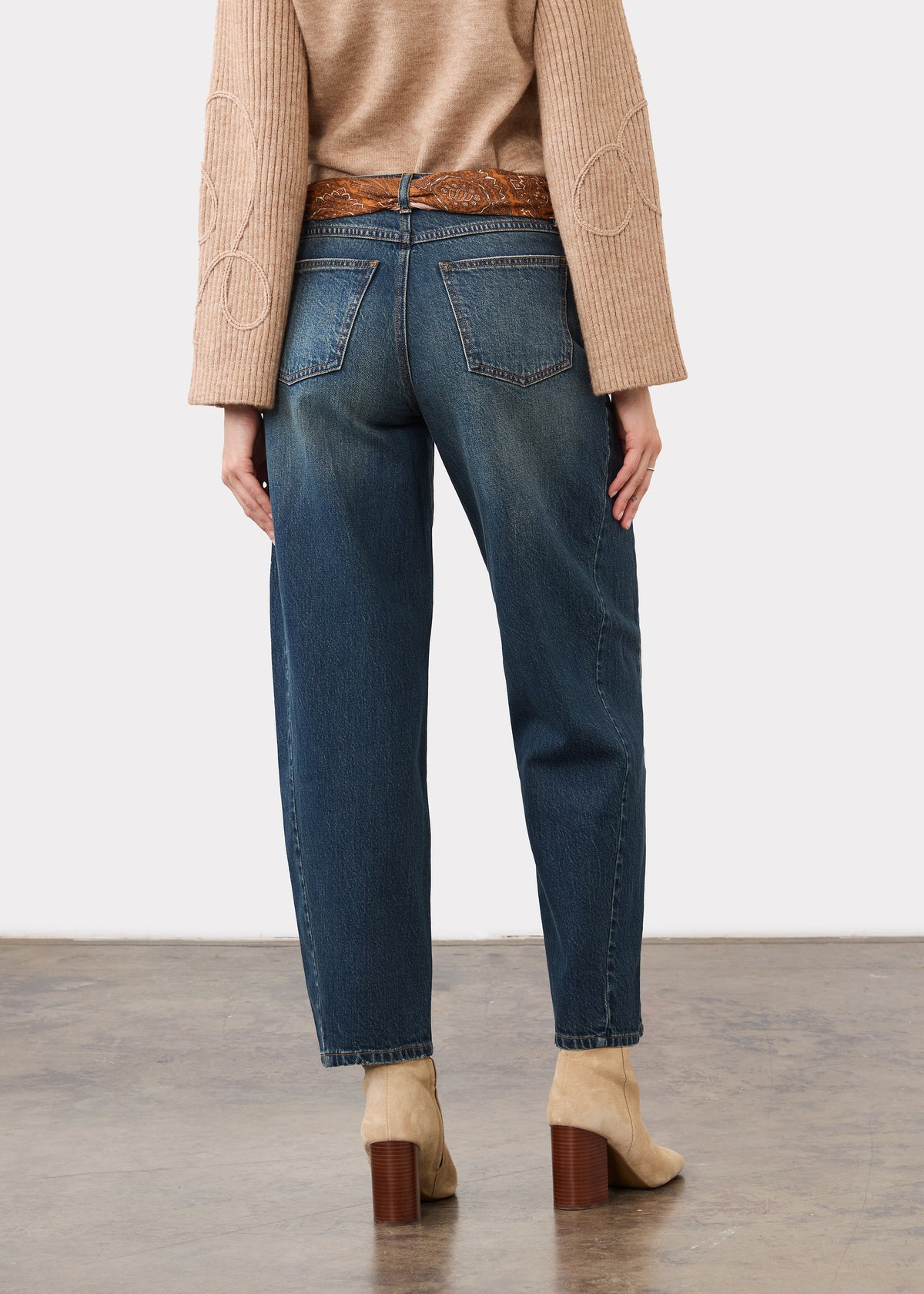 Back view of medium blue jeans highlighting patch pockets and straight leg cut by French Dressing Jeans (FDJ)