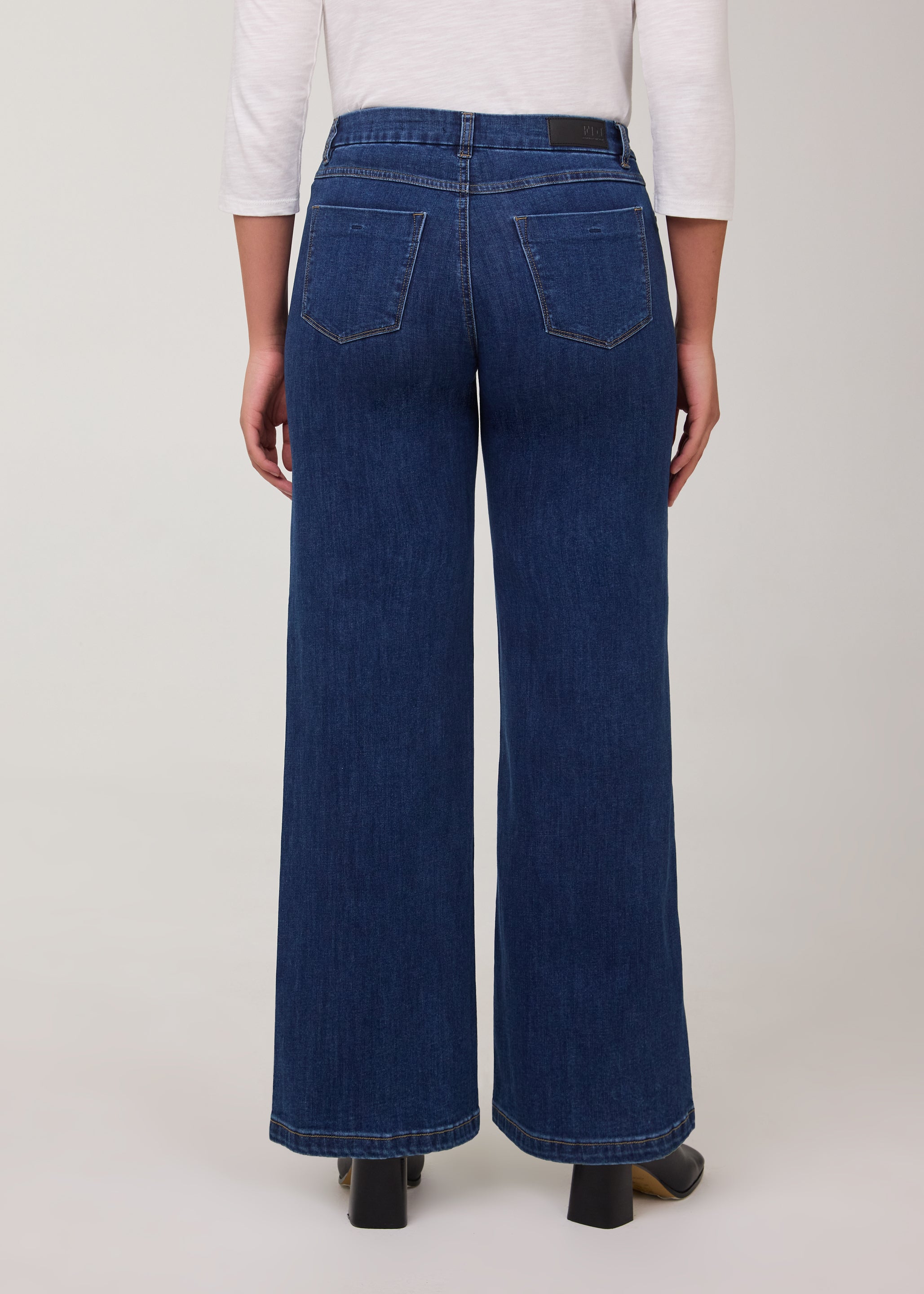 Back view of wide-leg jeans in Delight color with patch pockets by French Dressing Jeans (FDJ)