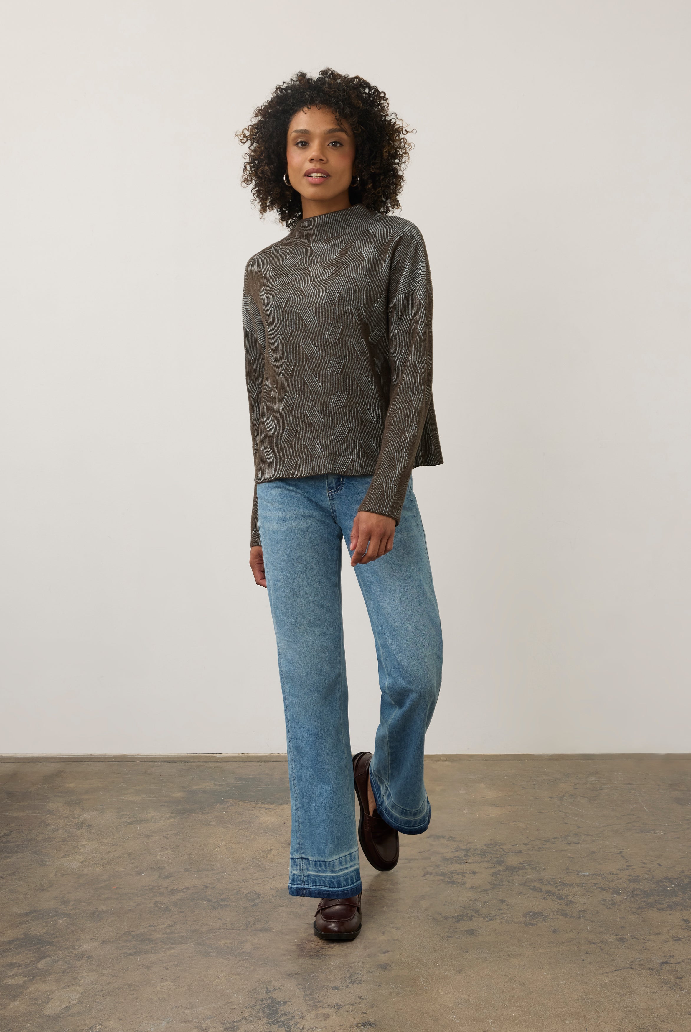 Model wearing brown textured top with jeans, full outfit view by French Dressing Jeans (FDJ)