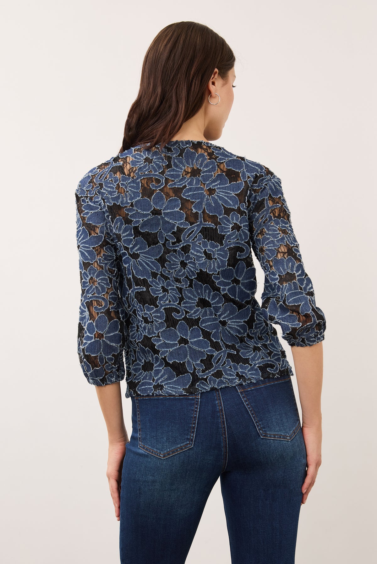 Back view of floral lace blouse showing detailed pattern and fit by French Dressing Jeans (FDJ)