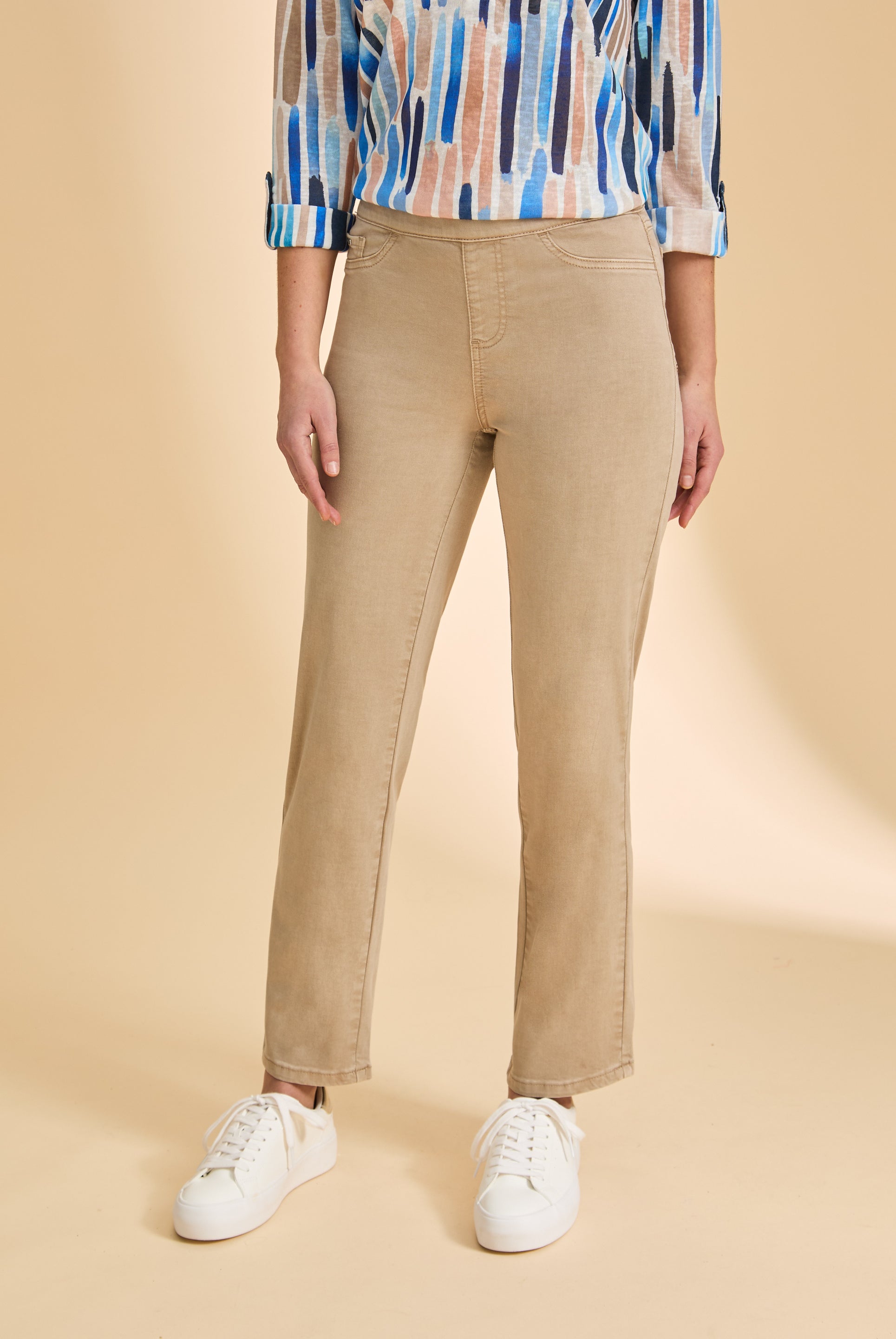 Close-up front view of sand straight-leg jeans, highlighting smooth silhouette by French Dressing Jeans (FDJ)