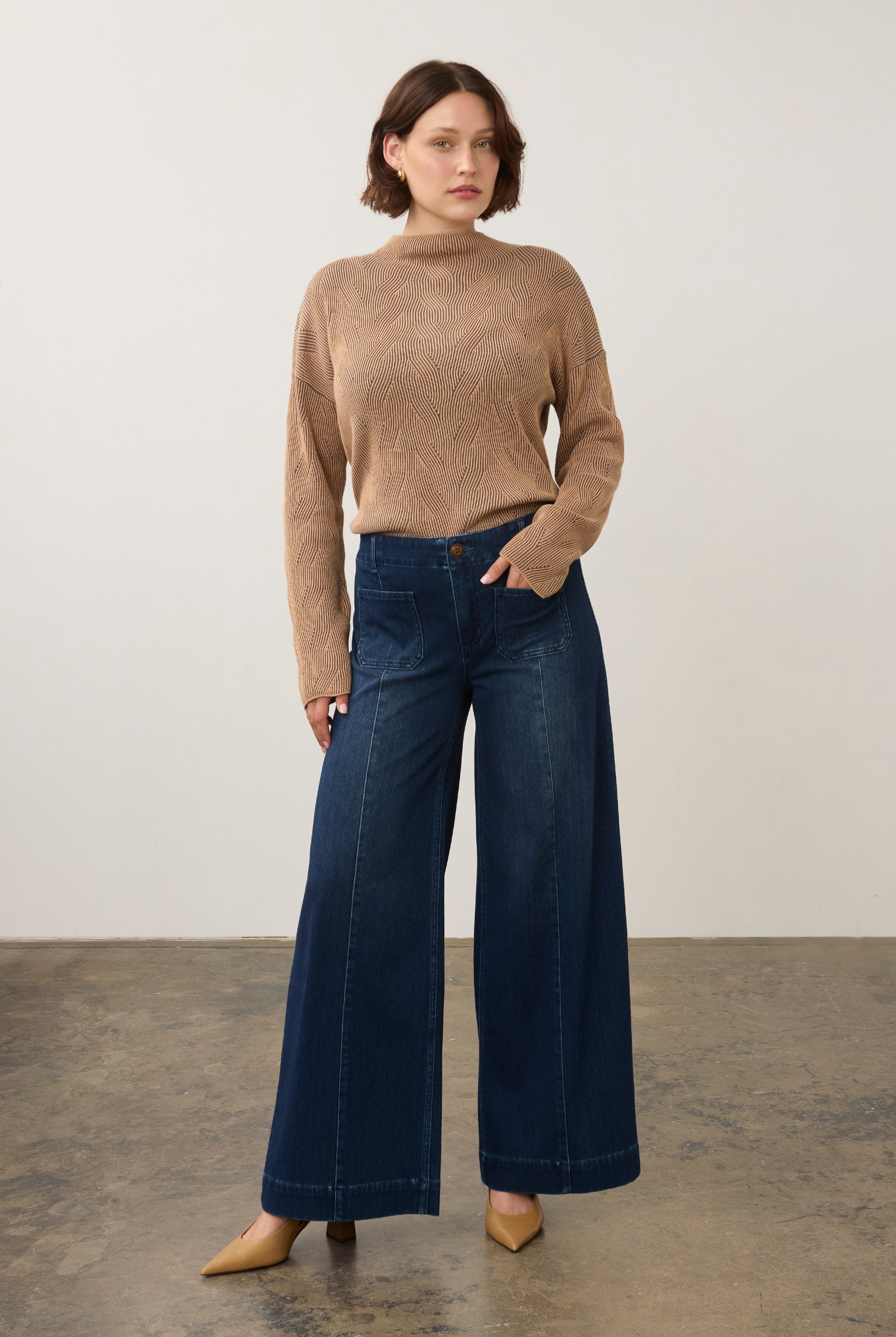 Dark rinse wide-leg jeans styled with knit sweater in full outfit view by French Dressing Jeans (FDJ)