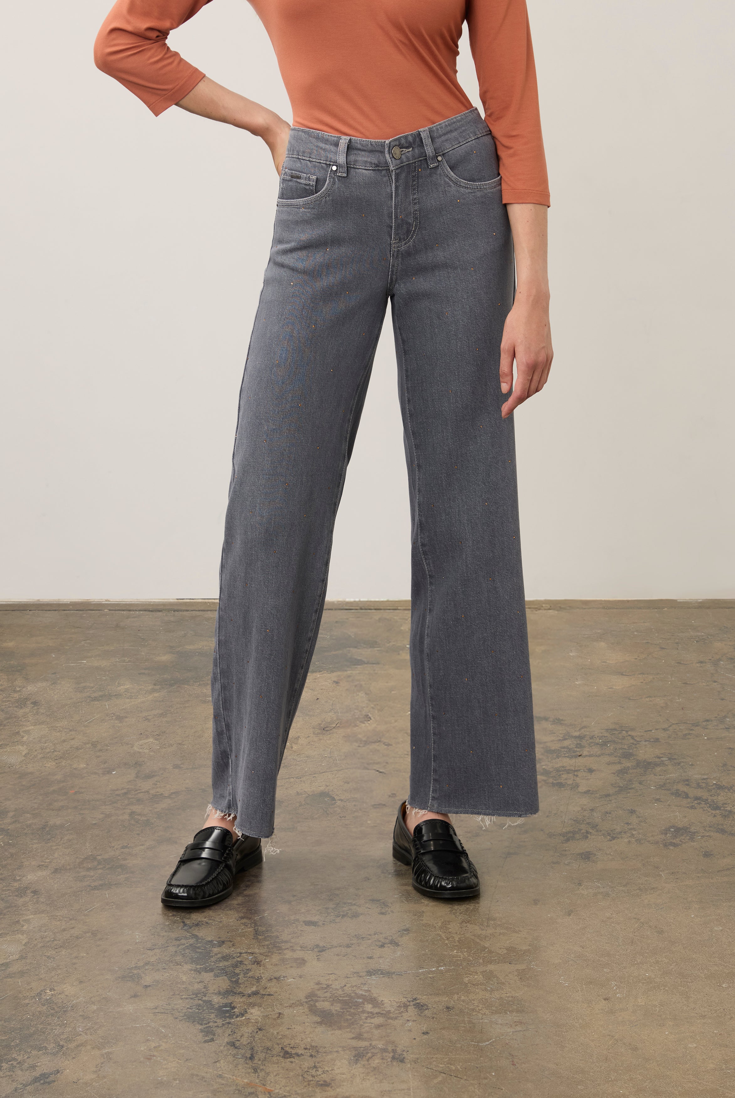 Front view of wide-leg denim with raw hem and subtle detailing in blue by French Dressing Jeans (FDJ) par French Dressing Jeans (FDJ)