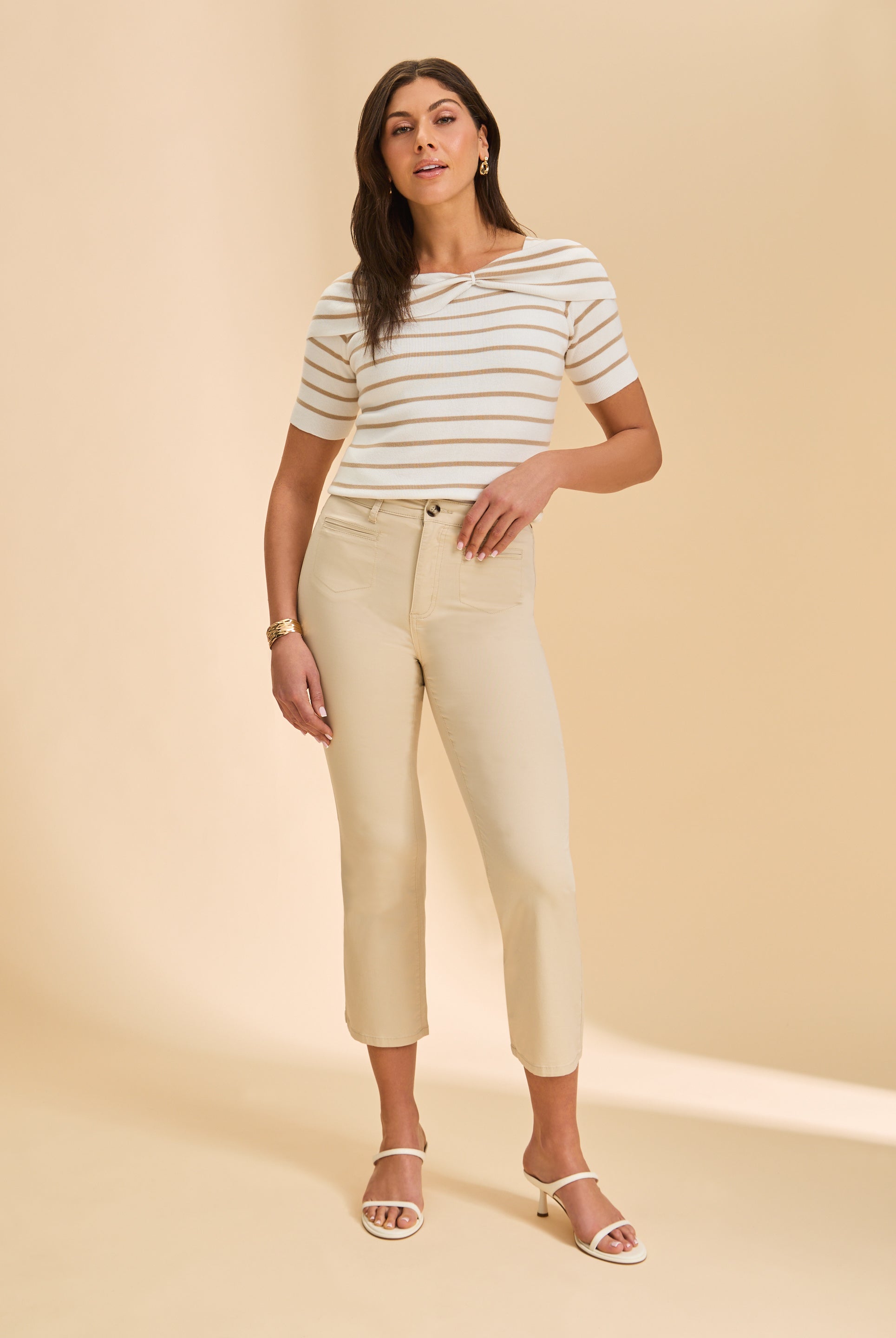 Front view of cream pants with high-rise waist and fitted crop leg by French Dressing Jeans (FDJ)