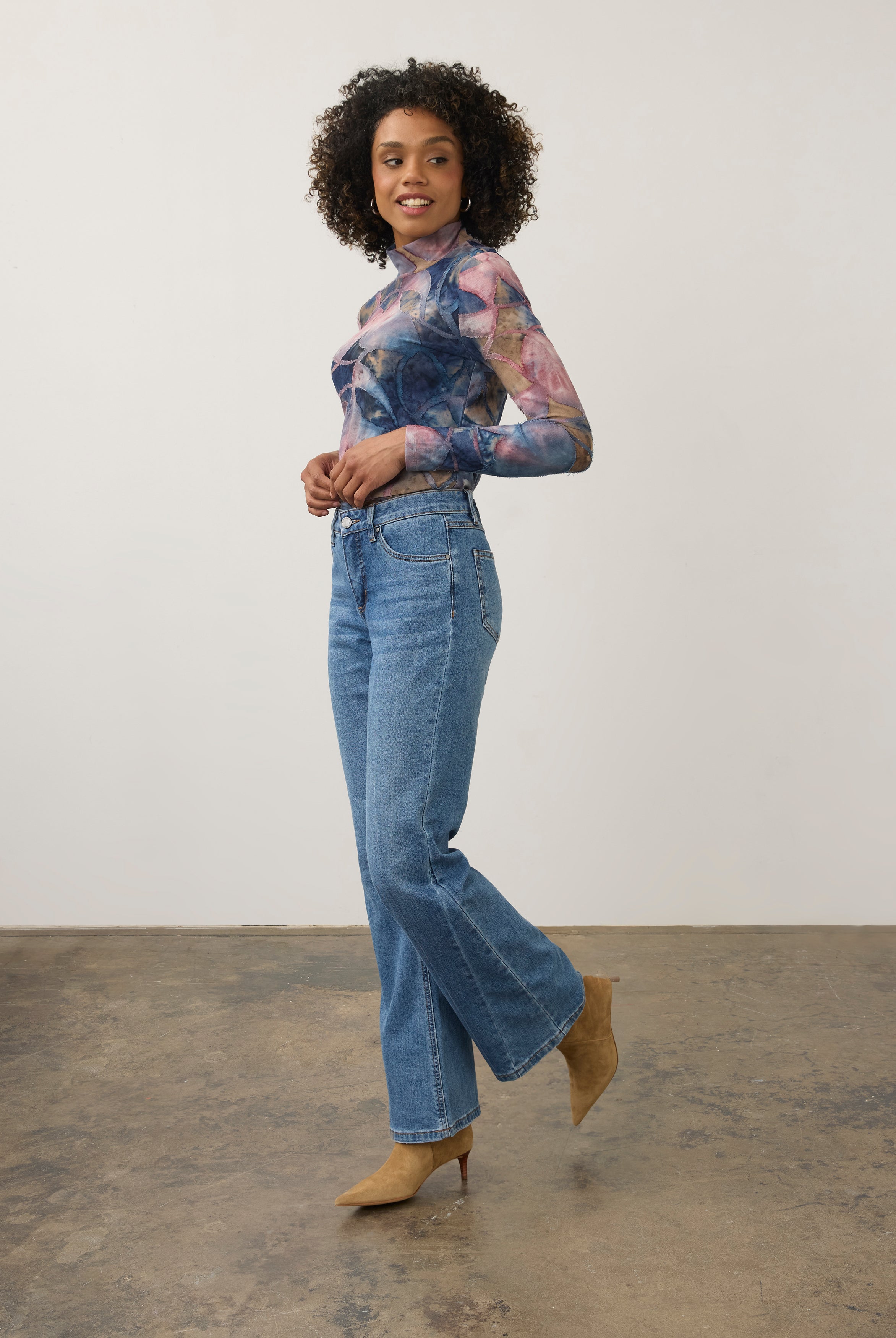 Full body view of medium wash denim pants showcasing high-rise waist and stylish fit by French Dressing Jeans (FDJ) par French Dressing Jeans (FDJ)