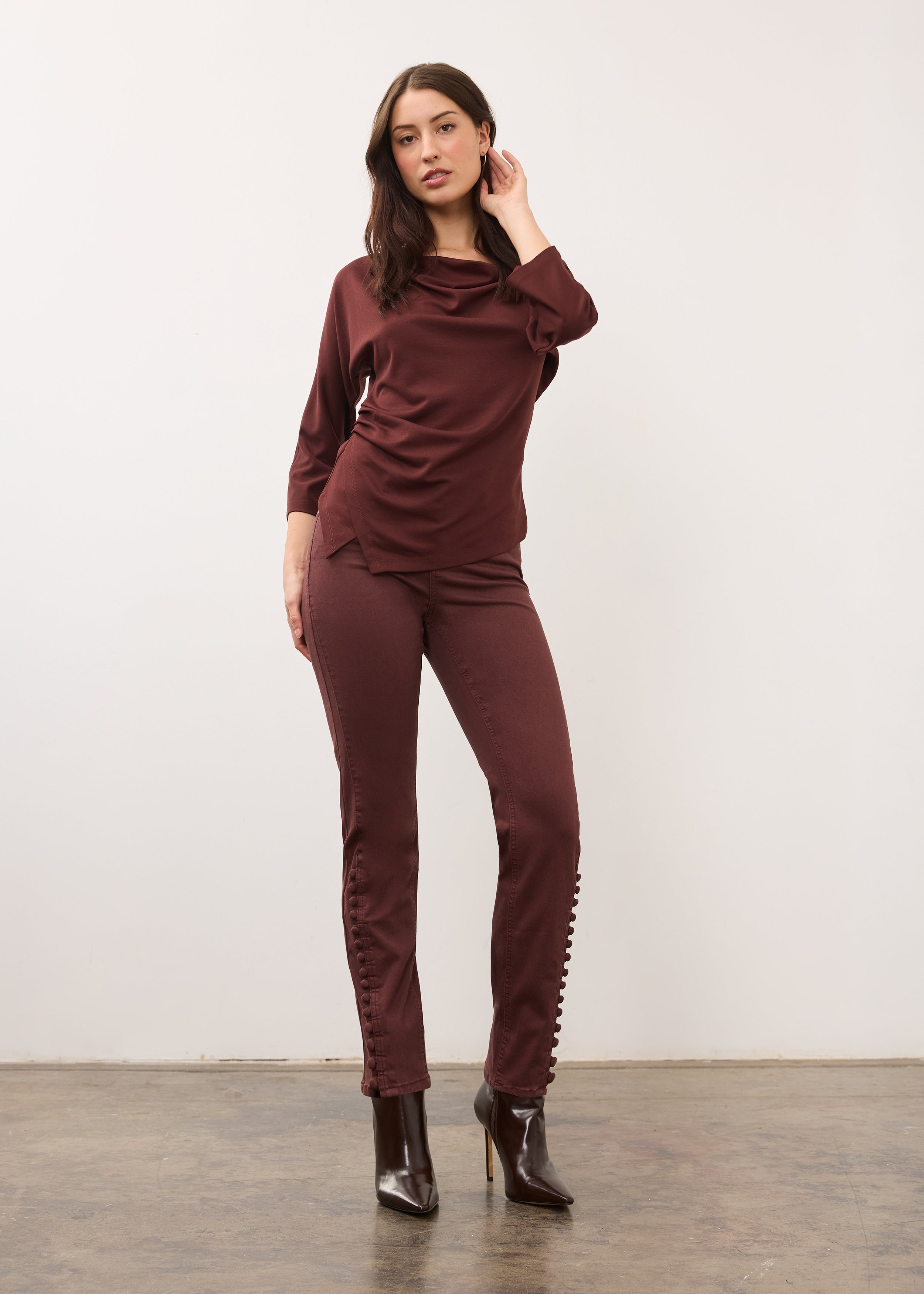 Full-body view of fig pencil leg denim showing mid-rise fit and side button details by French Dressing Jeans (FDJ)