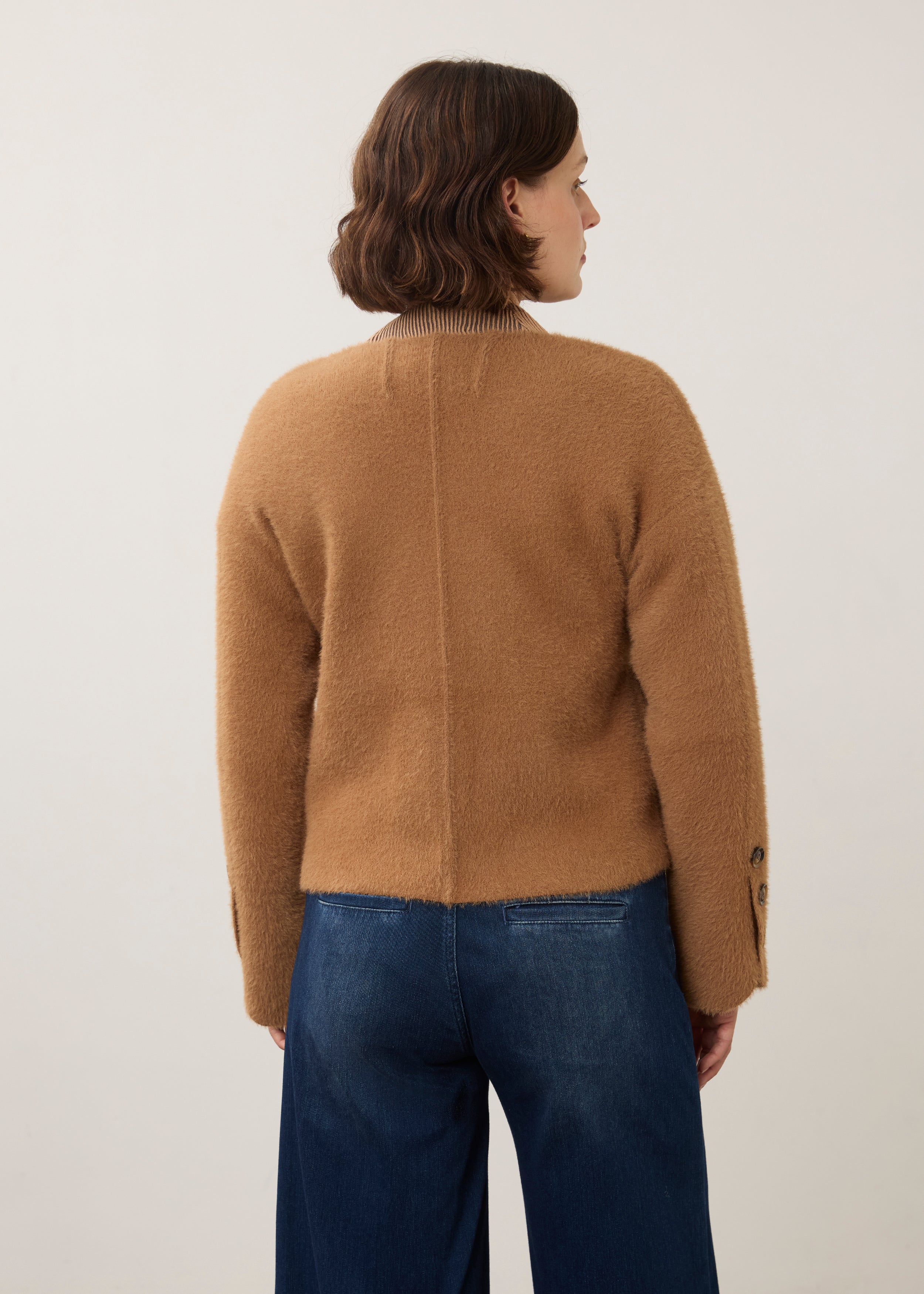 Back view of camel knit cardigan highlighting seamless back design by French Dressing Jeans (FDJ)