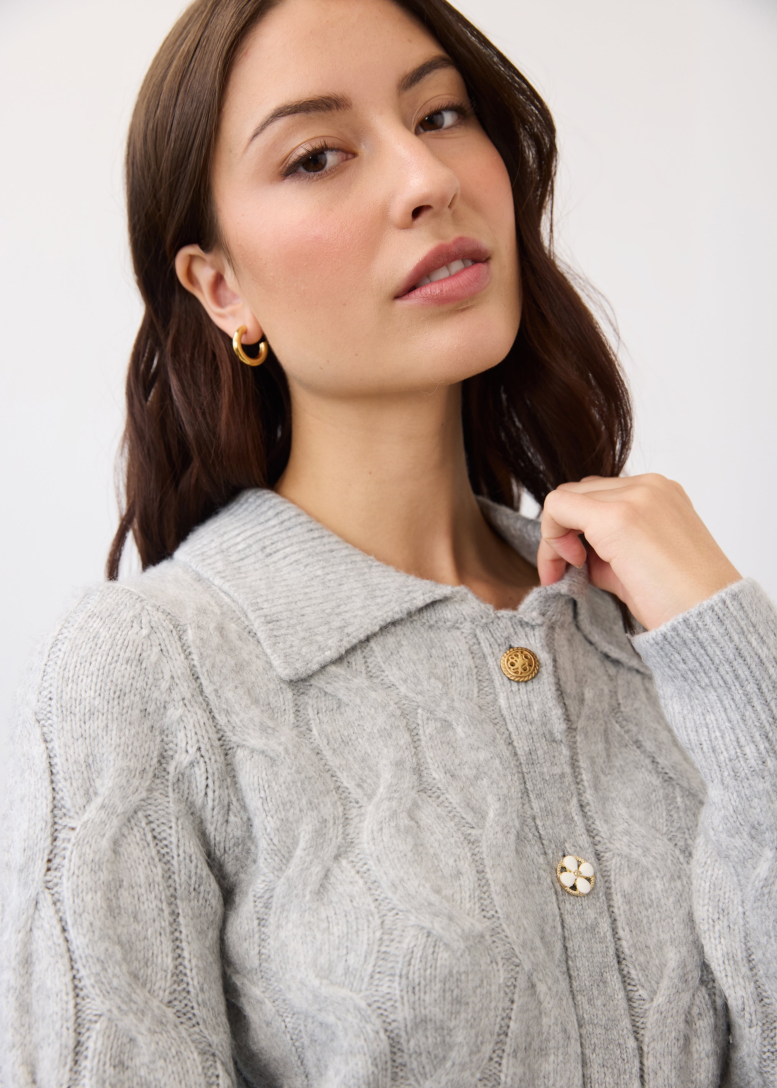 Close-up of gray cabled cardigan highlighting collar and button detail by French Dressing Jeans (FDJ)