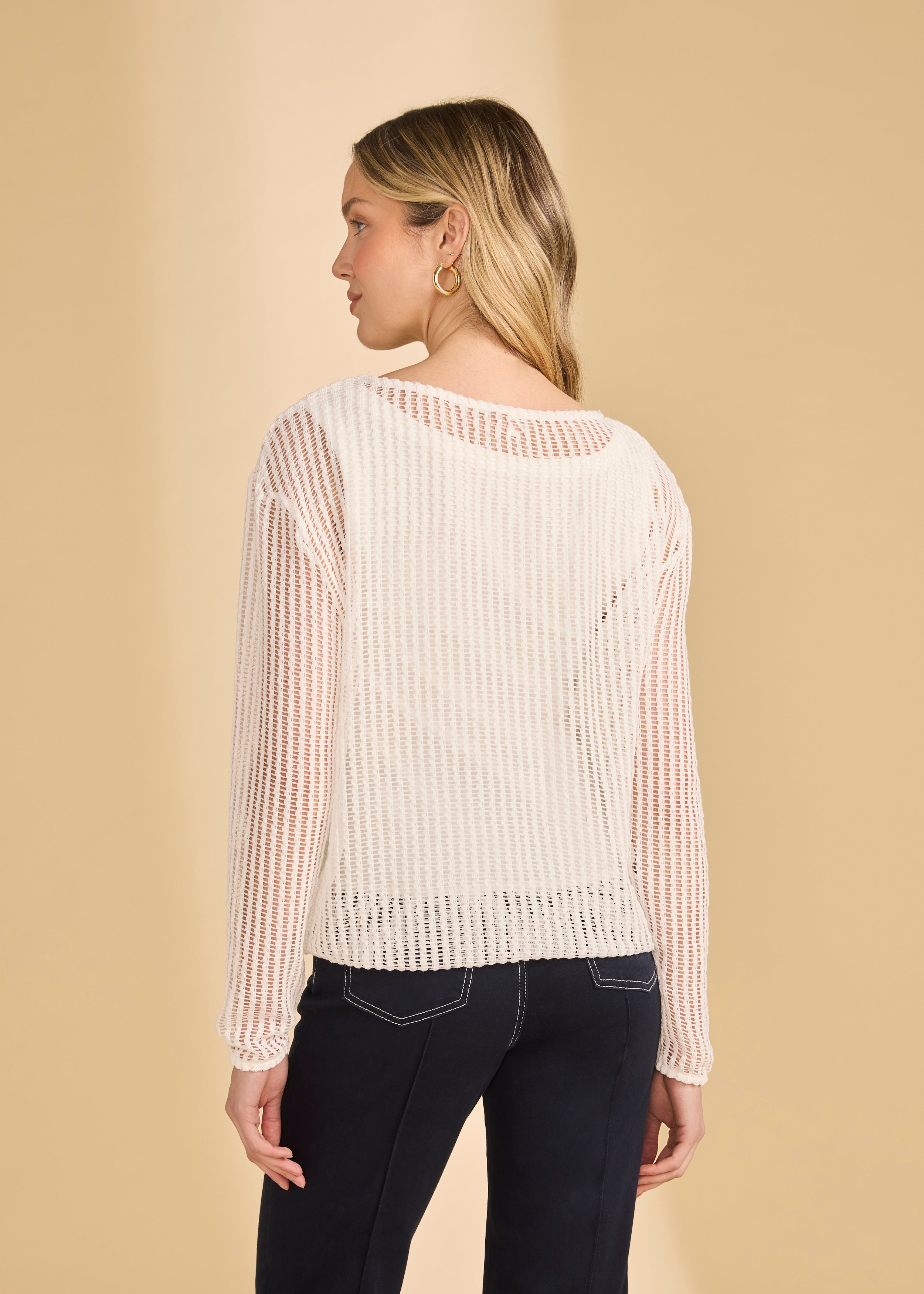 Back view of white mesh top showing lightweight fabric and long sleeves by French Dressing Jeans (FDJ)
