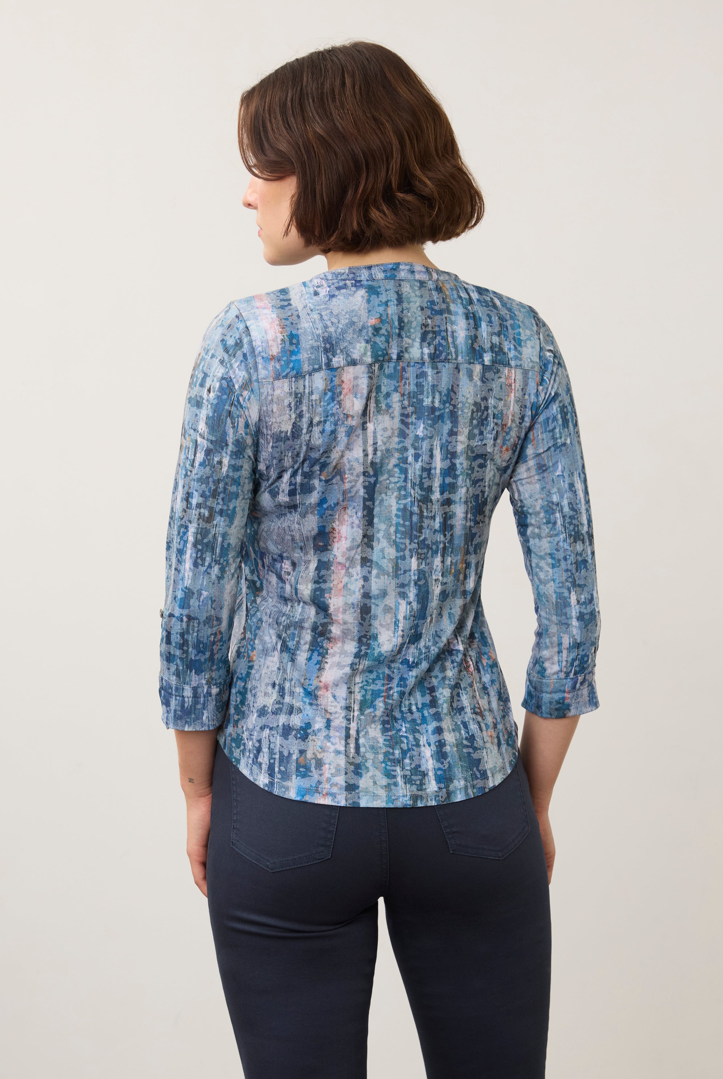 Back view of blue patterned 3/4 sleeve top showing seamless design by French Dressing Jeans (FDJ)