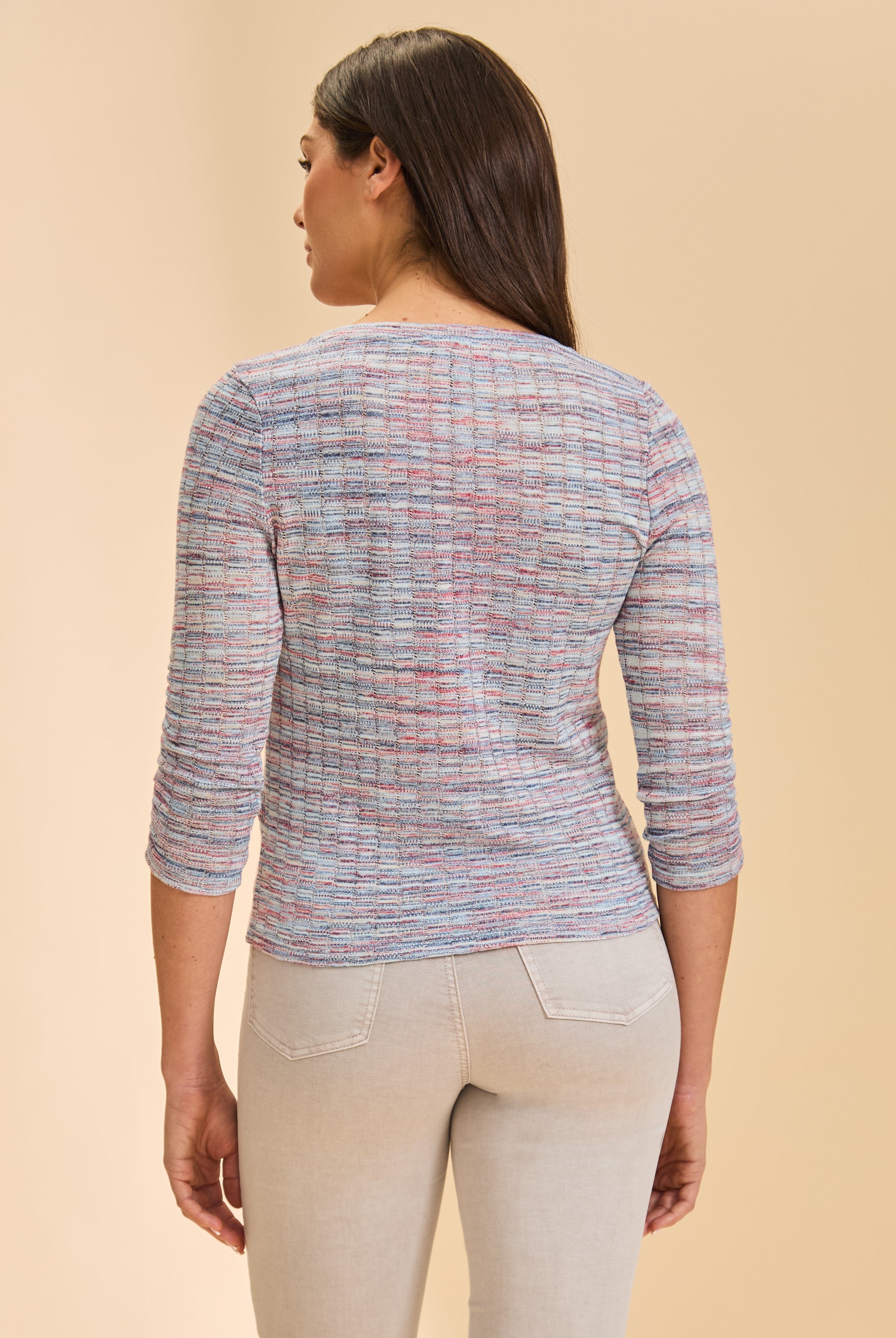 Back view of multicolor V-neck sweater highlighting textured pattern by French Dressing Jeans (FDJ)