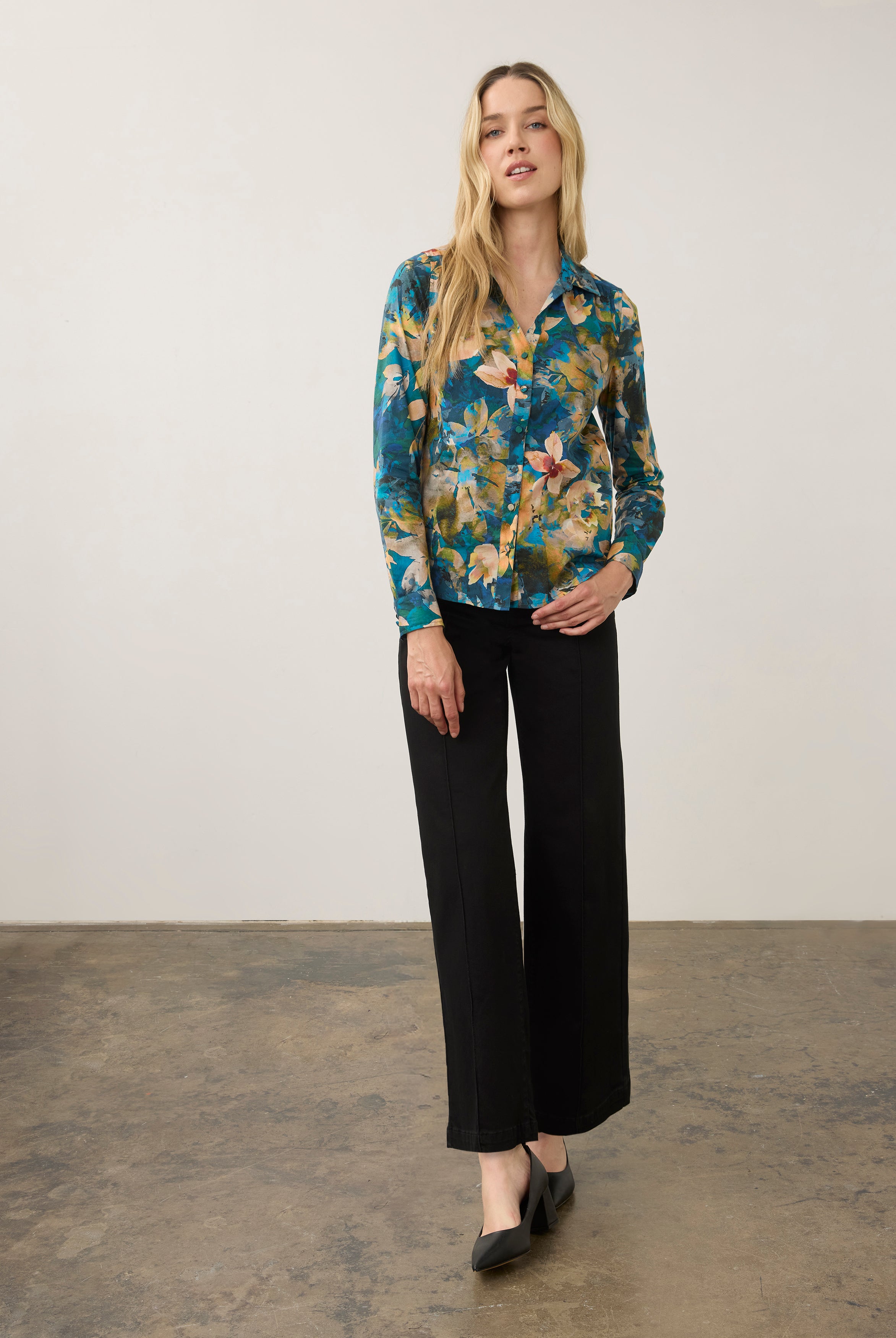 Full body shot of black wide leg denim styled with floral blouse by French Dressing Jeans (FDJ) par French Dressing Jeans (FDJ)